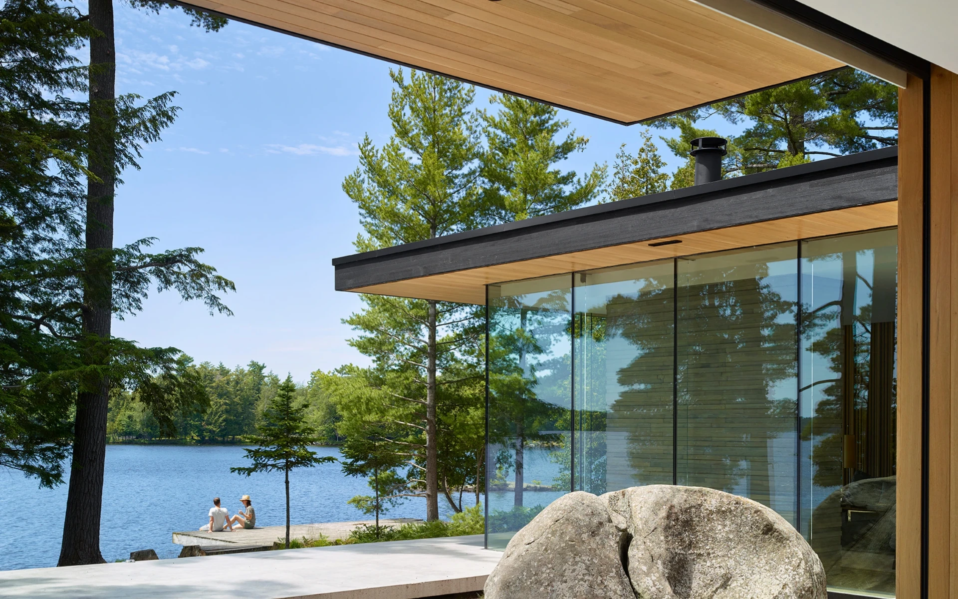Modern lakefront home and waterfront terrace