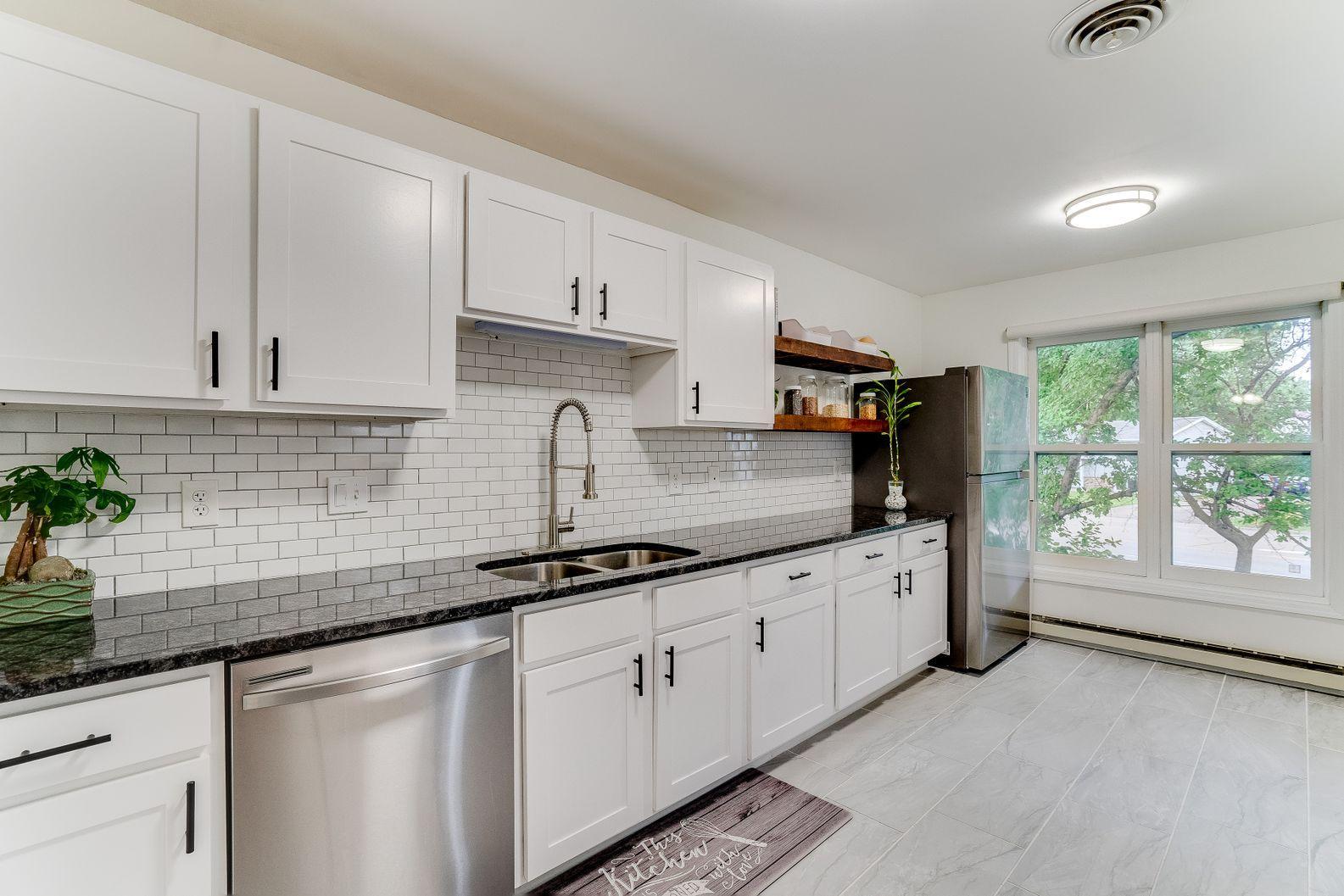 View of Residential at 717 Larpenteur Avenue #717E, Maplewood MN 55117, Maplewood - Mike Wilen | Minnesota Team Real Estate