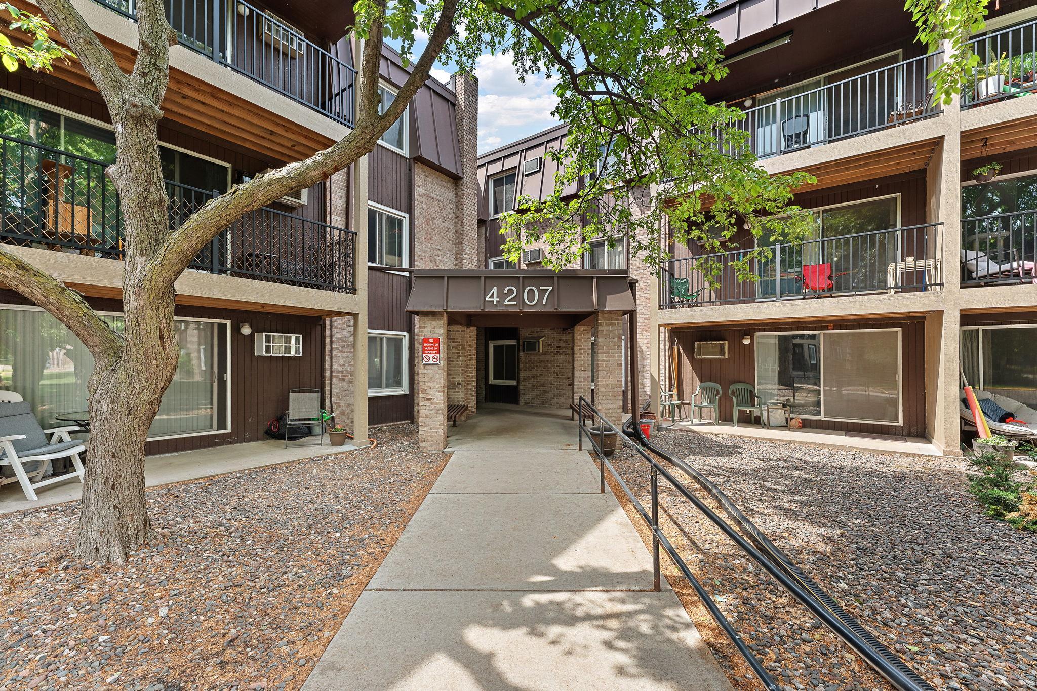 View of (CC) Low Rise (3- Levels) at 4207 Lakeside Avenue, Brooklyn Center - Mike Wilen | Minnesota Team Real Estate