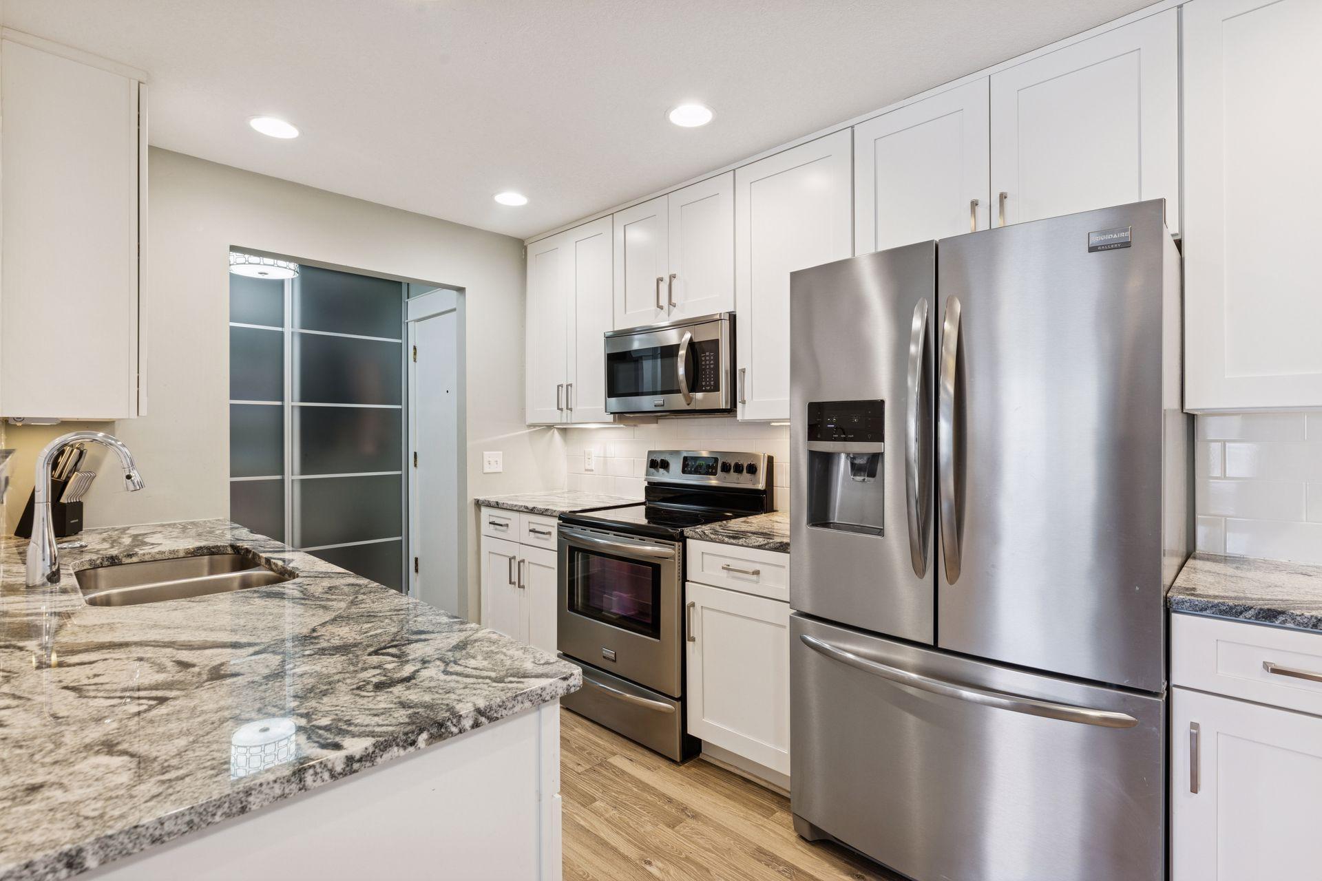 View of Residential at 205 Barry Avenue #221, Wayzata MN 55391, Wayzata - Mike Wilen | Minnesota Team Real Estate