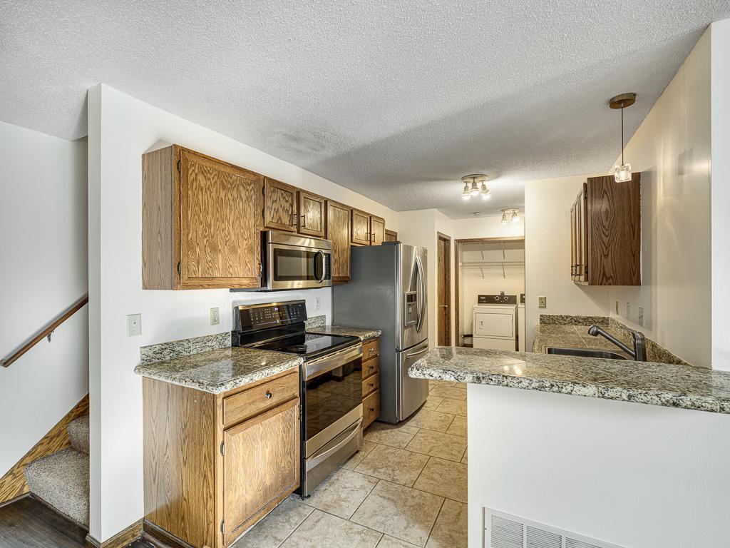 View of Residential at 1120 Pecks Woods Drive, New Brighton MN 55112, New Brighton (5 of 15) - Mike Wilen | Minnesota Team Real Estate