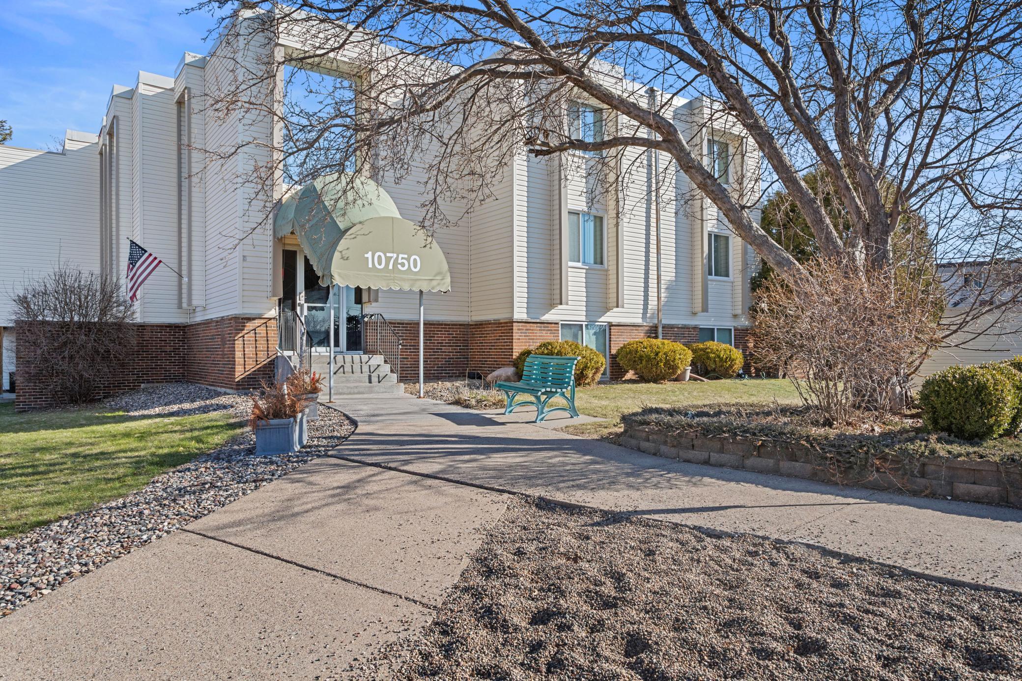 View of (CC) Low Rise (3- Levels) at 10750 Rockford Road, Plymouth - Mike Wilen | Minnesota Team Real Estate