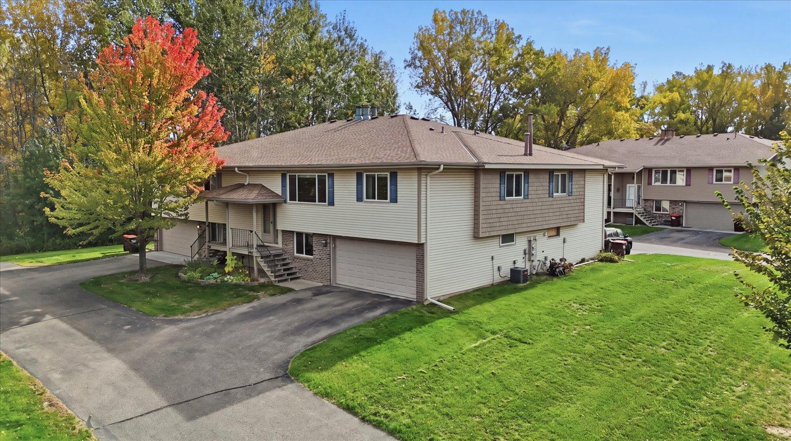 View of (TH) Quad/4 Corners at 6838 Sandlewood Road, Woodbury - Mike Wilen | Minnesota Team Real Estate