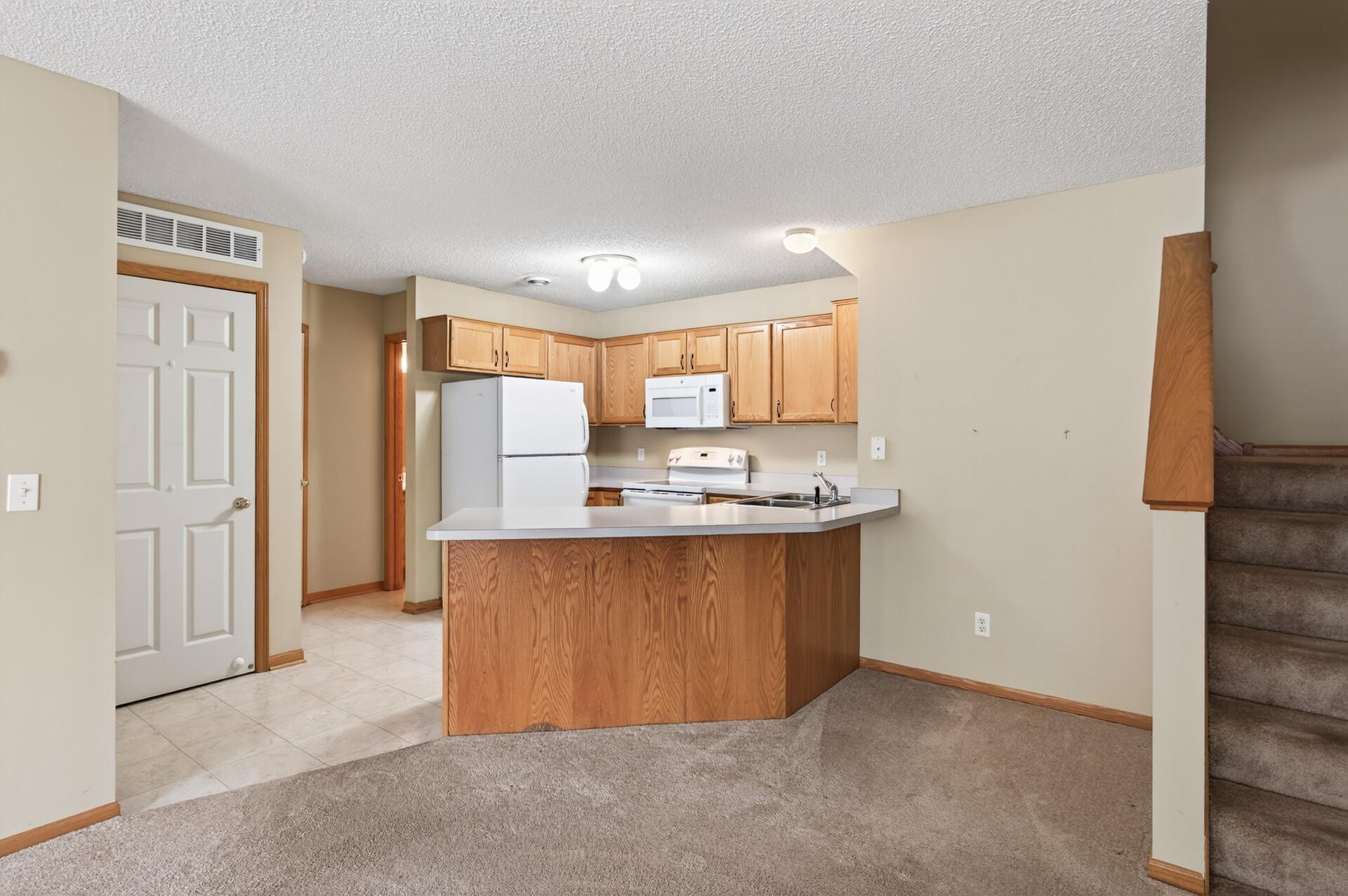 View of Residential at 8639 Quarry Ridge Lane #I, Woodbury MN 55125, Woodbury (5 of 18) - Mike Wilen | Minnesota Team Real Estate