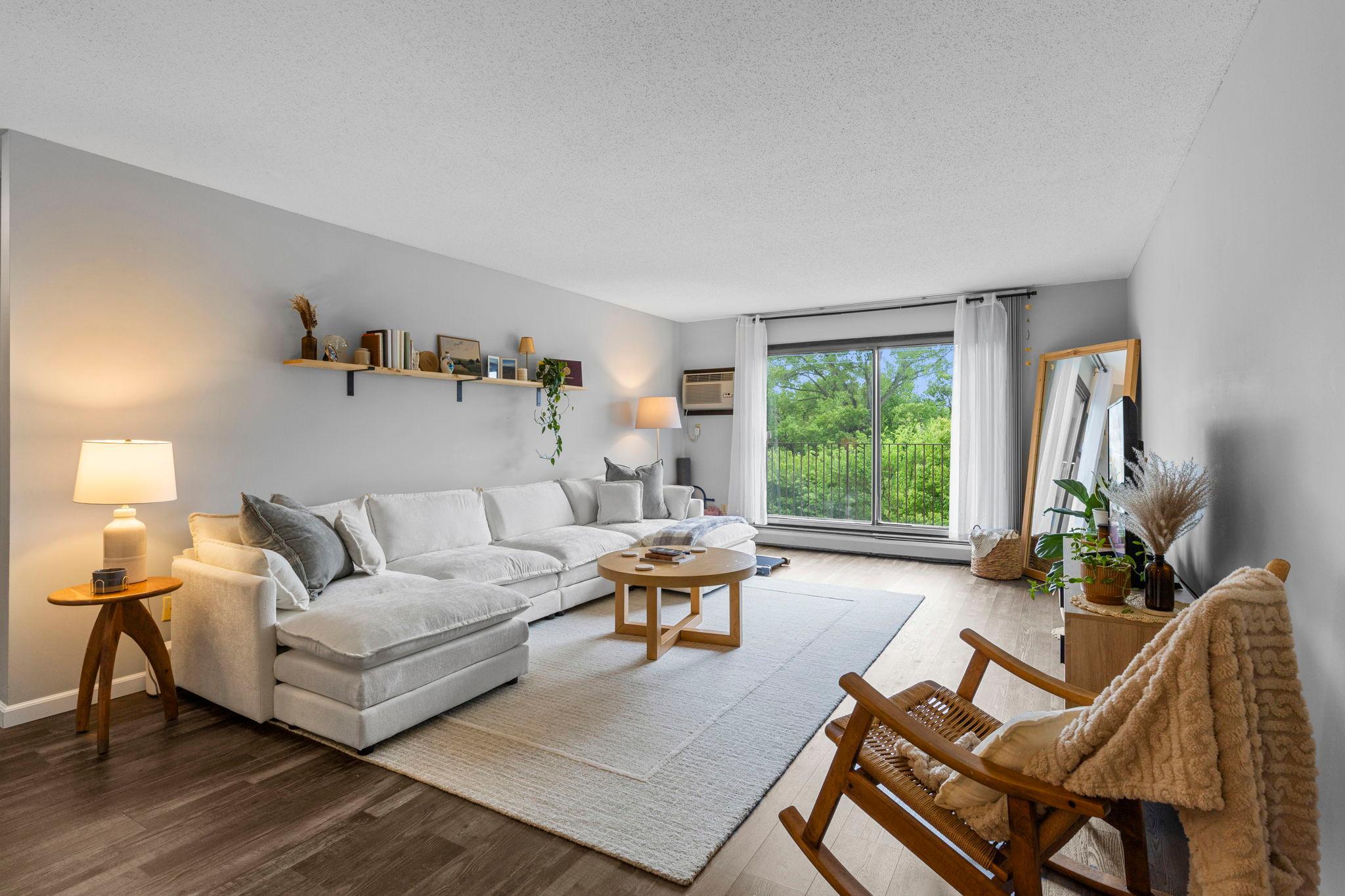 View of (CC) Low Rise (3- Levels) at 1304 Medicine Lake Drive, Plymouth - Mike Wilen | Minnesota Team Real Estate