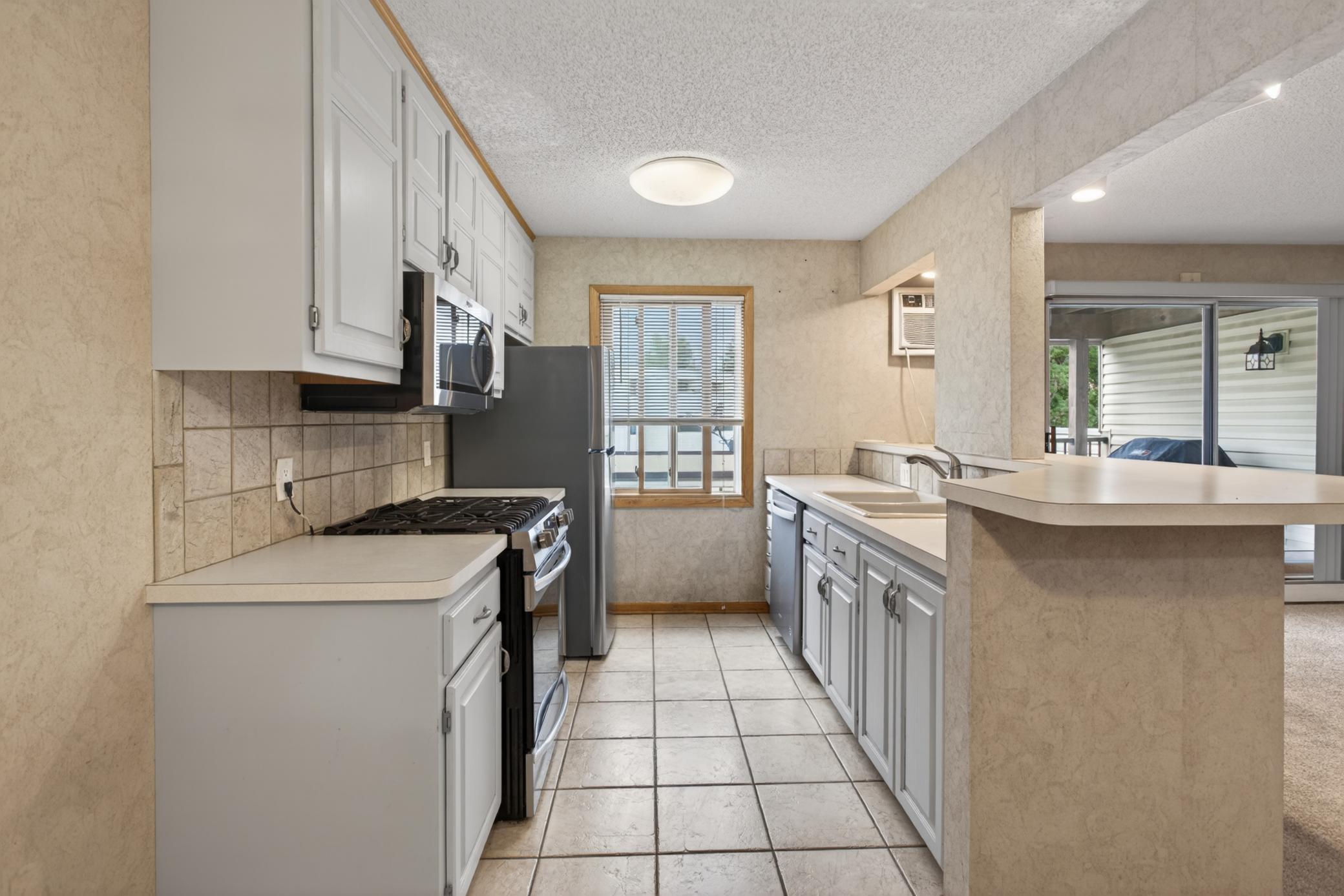 View of Residential at 10720 Rockford Road #205, Plymouth MN 55442, Plymouth (5 of 28) - Mike Wilen | Minnesota Team Real Estate