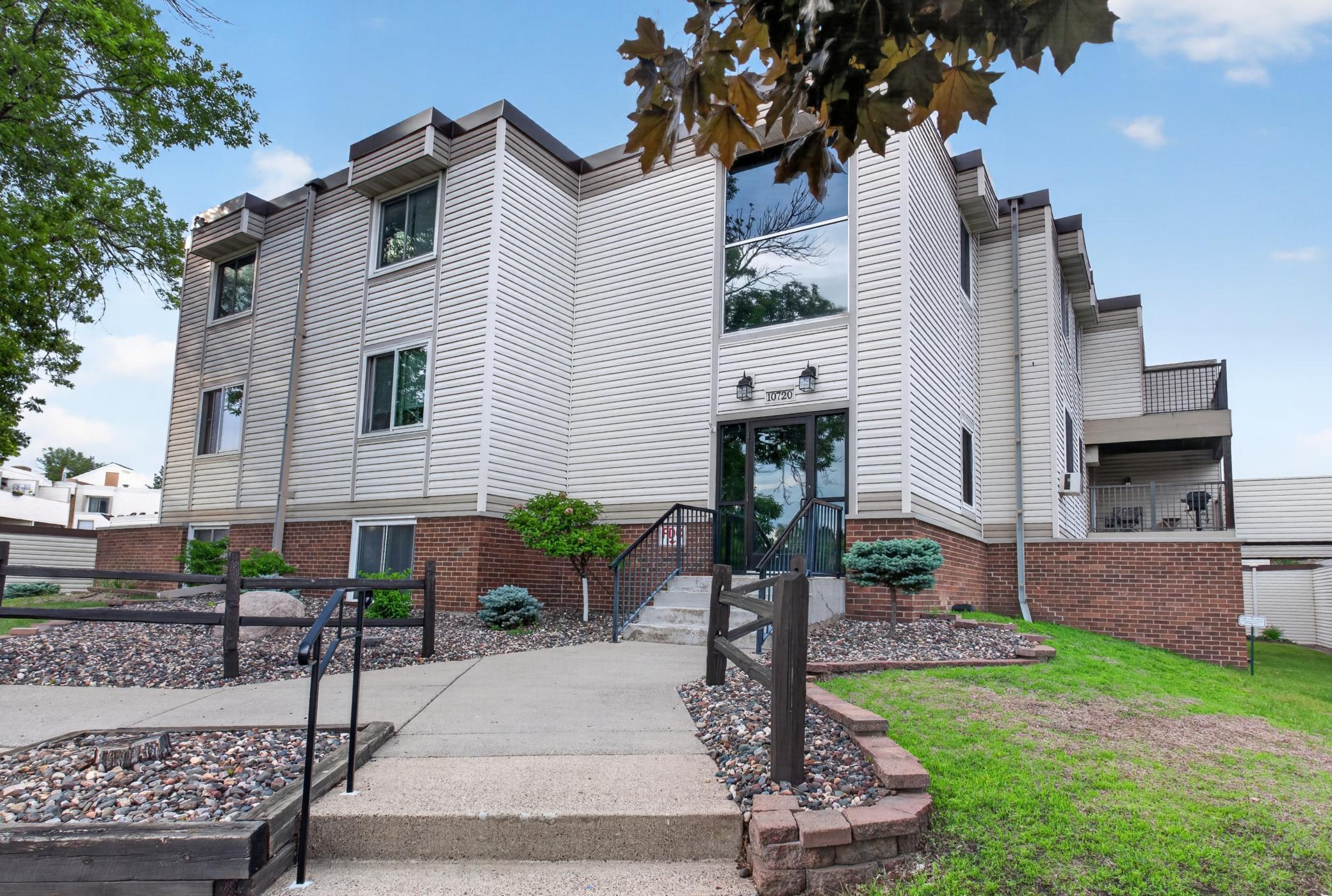 View of (CC) Low Rise (3- Levels) at 10720 Rockford Road, Plymouth - Mike Wilen | Minnesota Team Real Estate