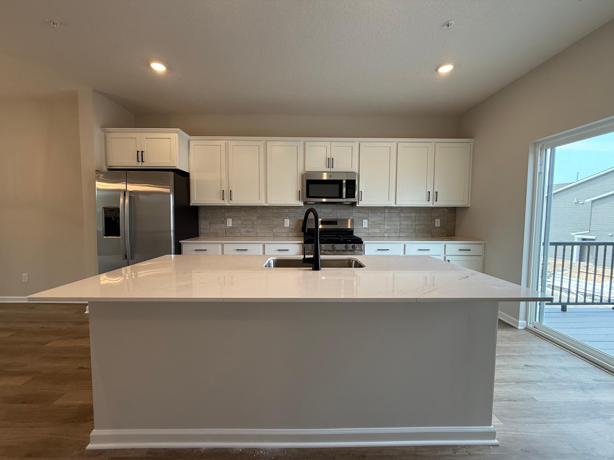 View of (TH) Side x Side at 13624 Willow Drive, Rogers - Mike Wilen | Minnesota Team Real Estate