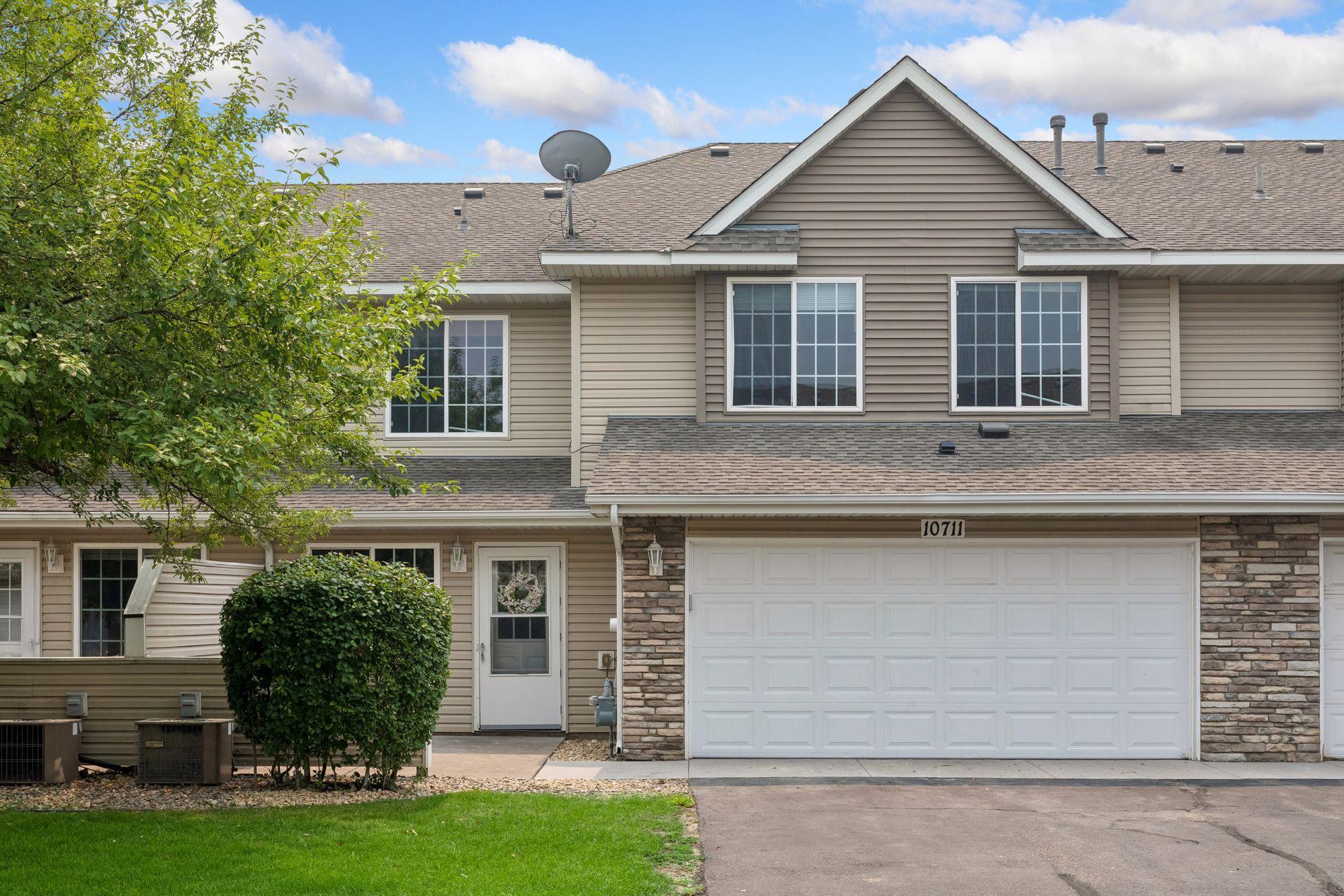 View of (TH) Side x Side at 10711 Unity Lane, Brooklyn Park - Mike Wilen | Minnesota Team Real Estate