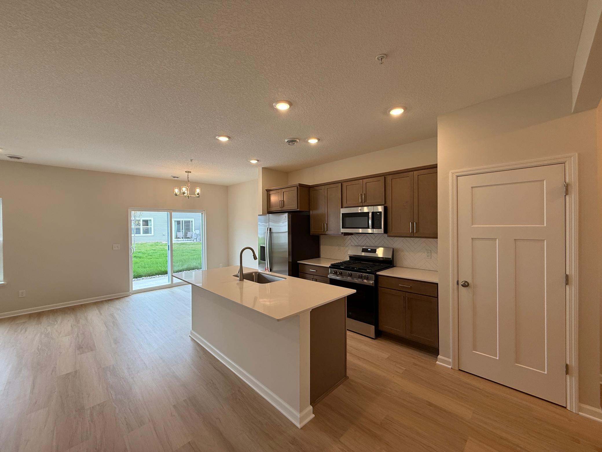 View of (TH) Side x Side at 23158 Creekview Court, Rogers - Mike Wilen | Minnesota Team Real Estate