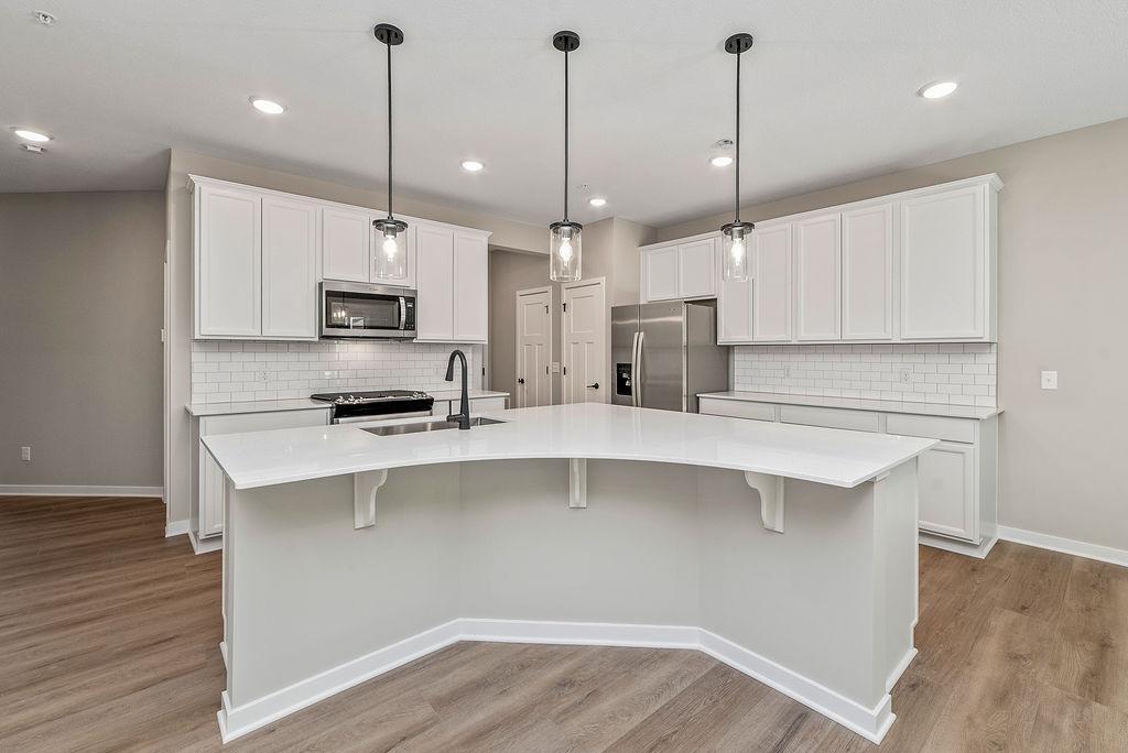 View of (TH) Side x Side at 12840 Sawyer Lane, Rogers - Mike Wilen | Minnesota Team Real Estate