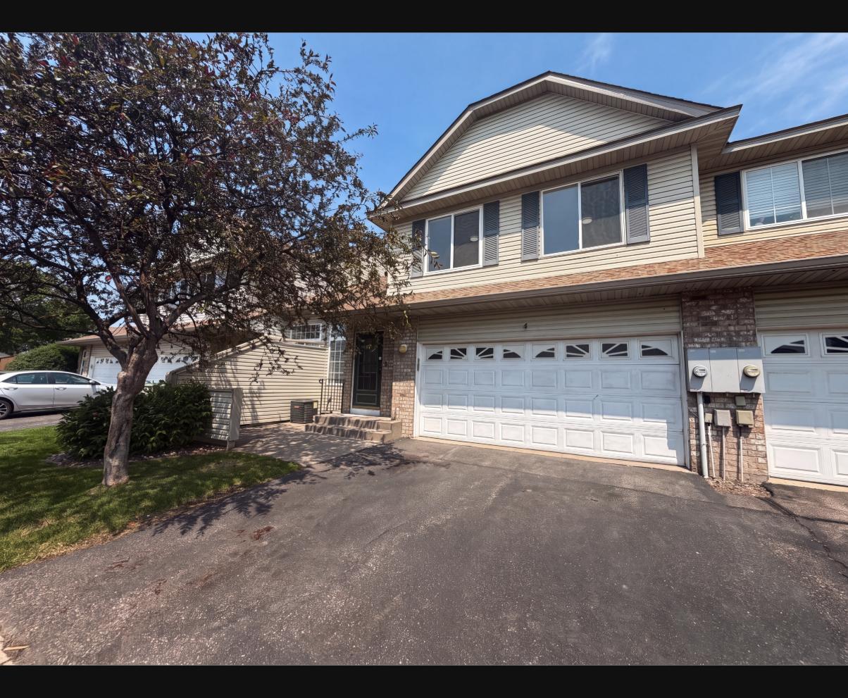 View of (TH) Side x Side at 14210 Xenon Street, Anoka - Mike Wilen | Minnesota Team Real Estate