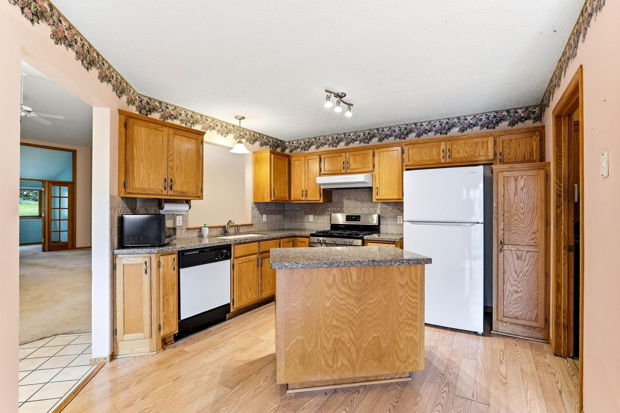 View of Residential at 7050 Robinwood Trail, Woodbury MN 55125, Woodbury (8 of 11) - Mike Wilen | Minnesota Team Real Estate