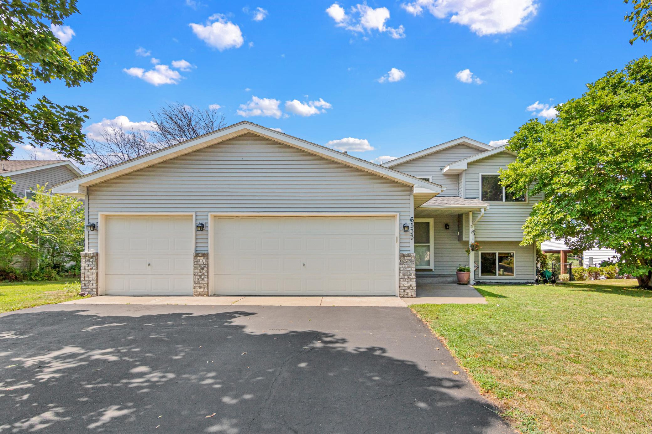 View of Single Family at 6533 Neddersen Circle, Brooklyn Park - Mike Wilen | Minnesota Team Real Estate