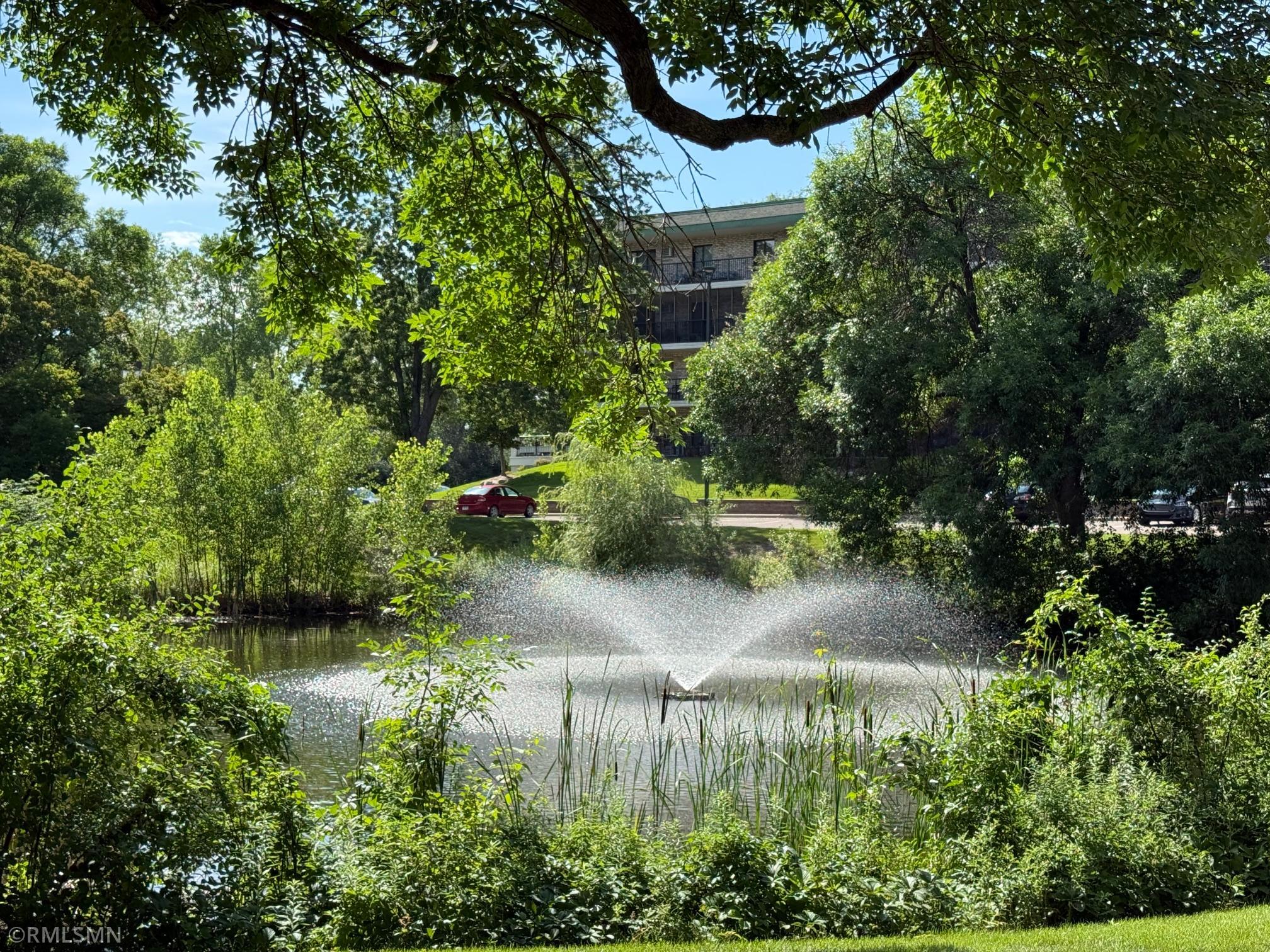 View of (CC) High Rise (4+ Levels) at 10511 Cedar Lake Road, Minnetonka - Mike Wilen | Minnesota Team Real Estate