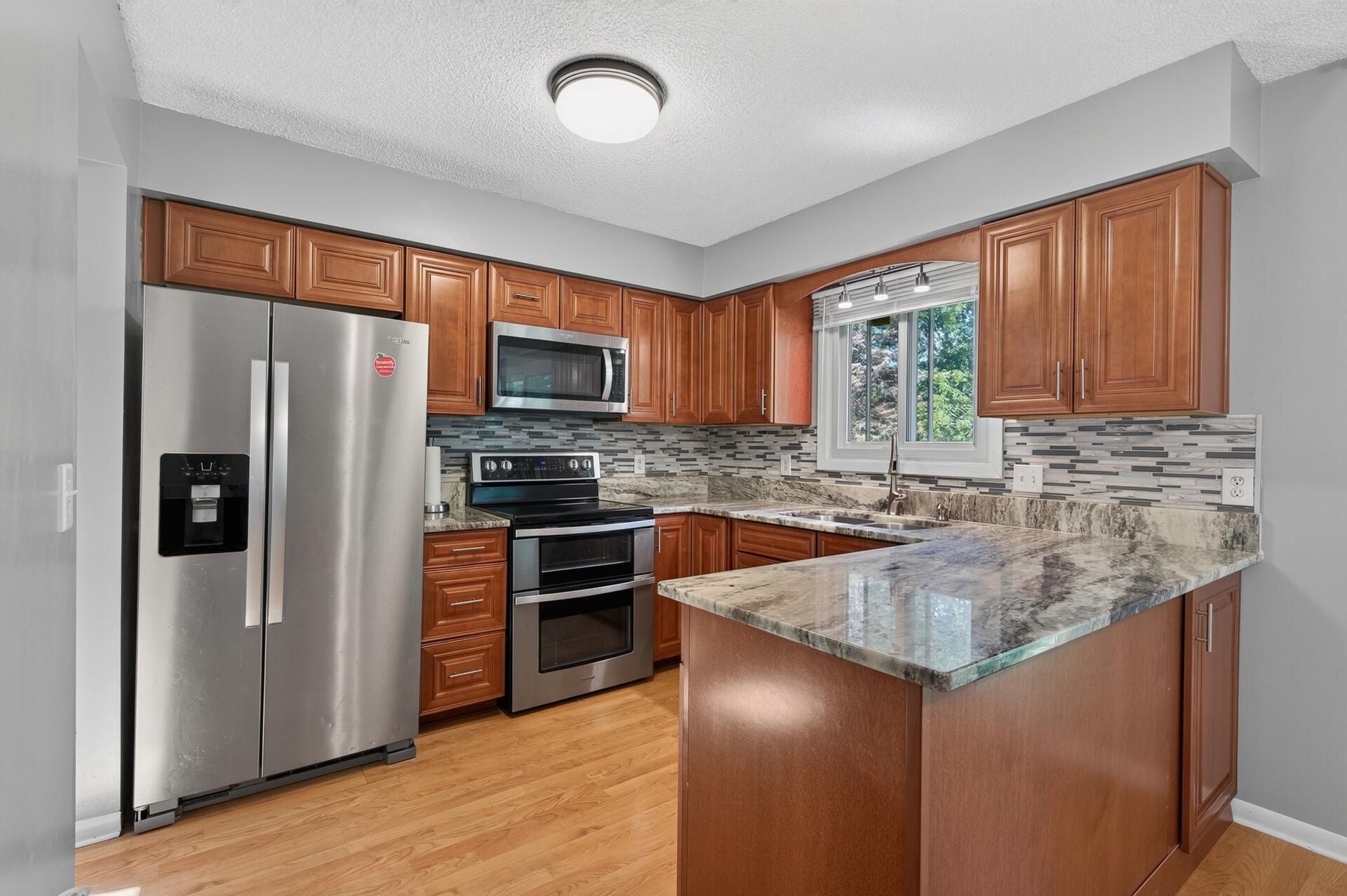 View of Residential at 1652 84th Court, Brooklyn Park MN 55444, Brooklyn Park (10 of 40) - Mike Wilen | Minnesota Team Real Estate