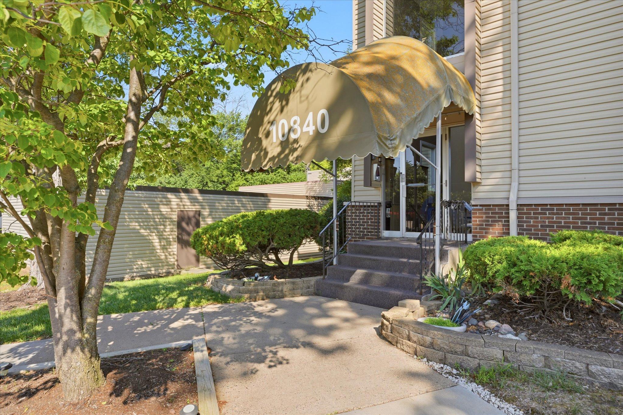 View of (CC) Low Rise (3- Levels) at 10840 Rockford Road, Plymouth - Mike Wilen | Minnesota Team Real Estate