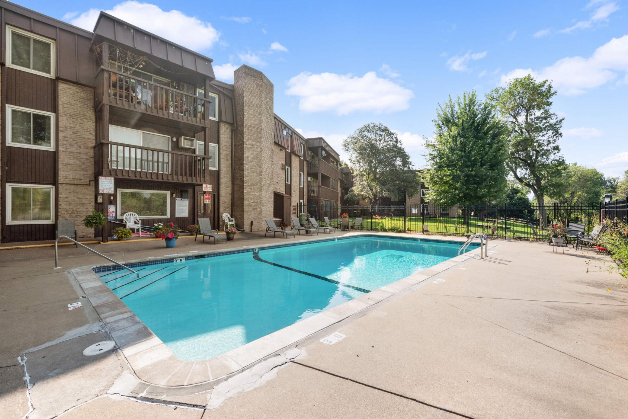 View of (CC) Low Rise (3- Levels) at 4201 Lakeside Avenue, Brooklyn Center - Mike Wilen | Minnesota Team Real Estate