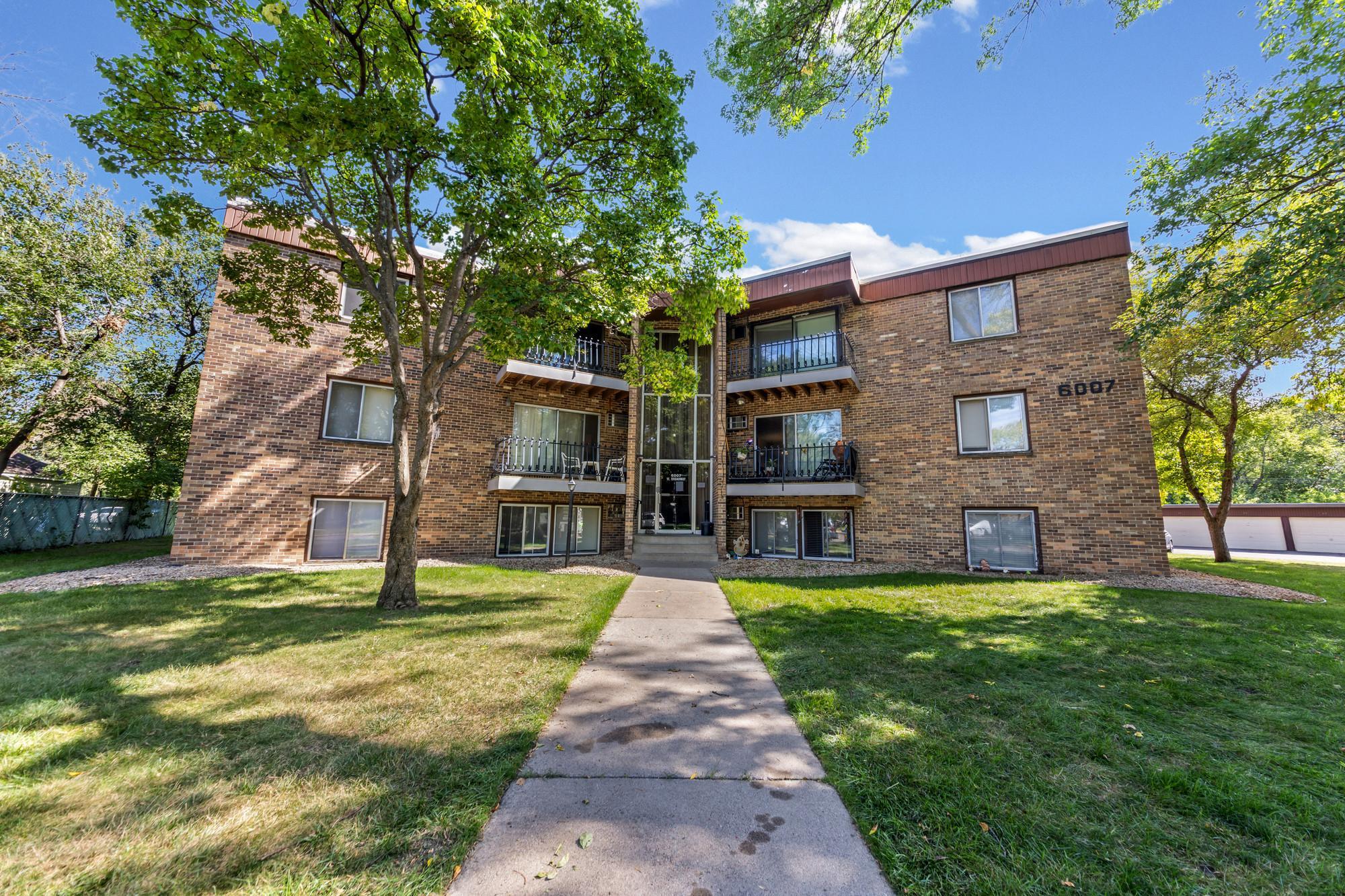 View of (CC) Low Rise (3- Levels) at 6007 Broadway Avenue, New Hope - Mike Wilen | Minnesota Team Real Estate