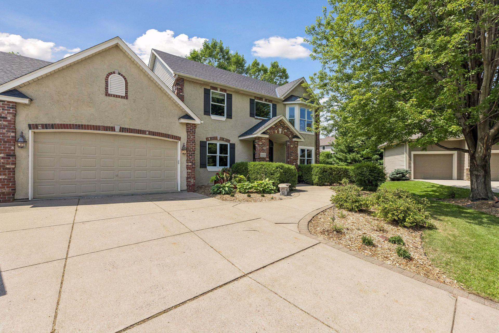 View of Single Family at 8235 Enclave Cove, Woodbury - Mike Wilen | Minnesota Team Real Estate