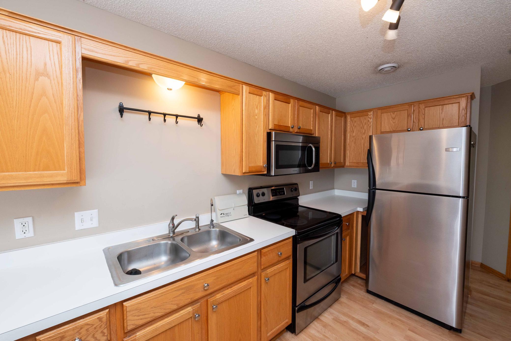 View of Residential at 8663 Quarry Ridge Lane #F, Woodbury MN 55125, Woodbury (31 of 49) - Mike Wilen | Minnesota Team Real Estate