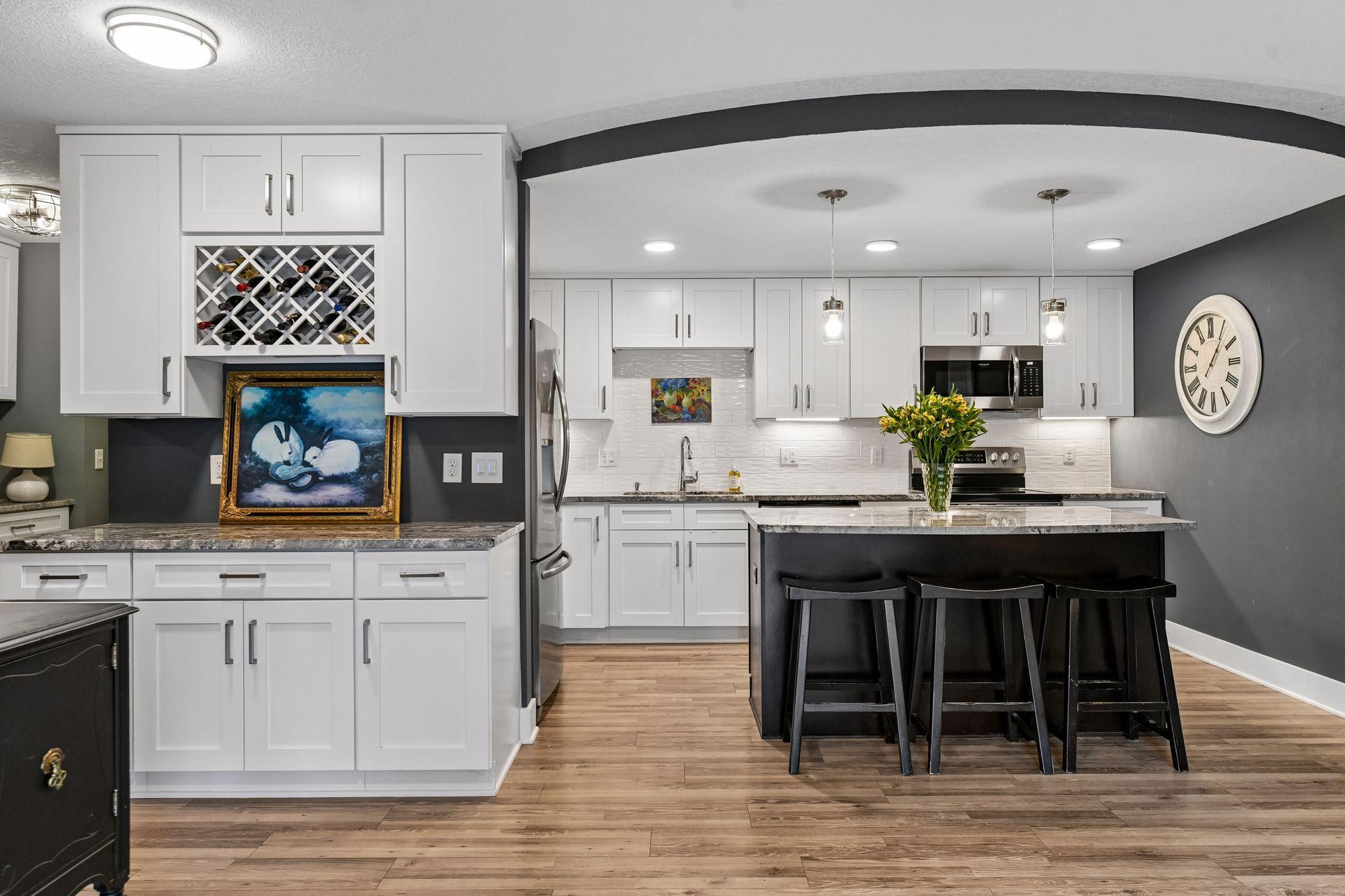 View of (CC) High Rise (4+ Levels) at 10411 Cedar Lake Road, Minnetonka - Mike Wilen | Minnesota Team Real Estate