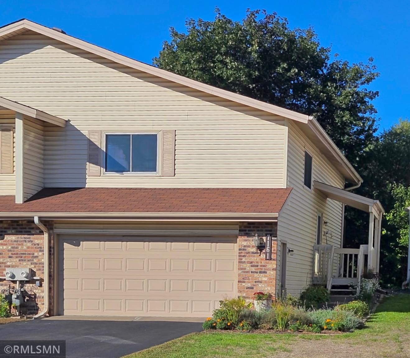 View of (TH) Side x Side at 7161 Unity Avenue, Brooklyn Center - Mike Wilen | Minnesota Team Real Estate