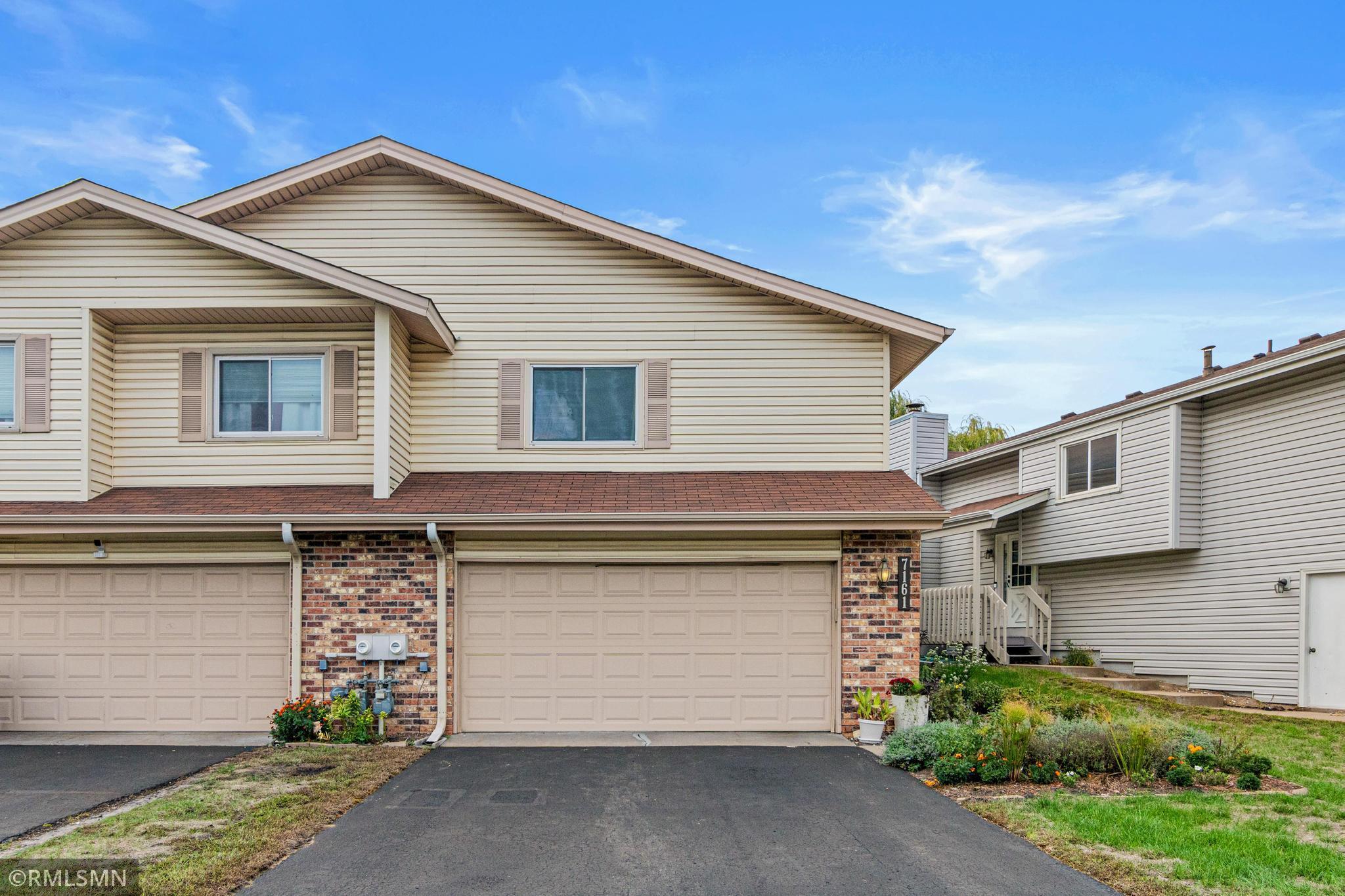 View of (TH) Side x Side at 7161 Unity Avenue, Brooklyn Center - Mike Wilen | Minnesota Team Real Estate