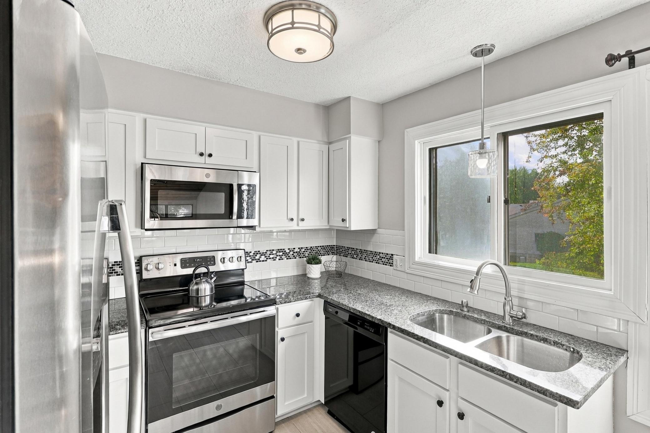 View of (TH) Side x Side at 169 Bordeaux Court, Woodbury - Mike Wilen | Minnesota Team Real Estate