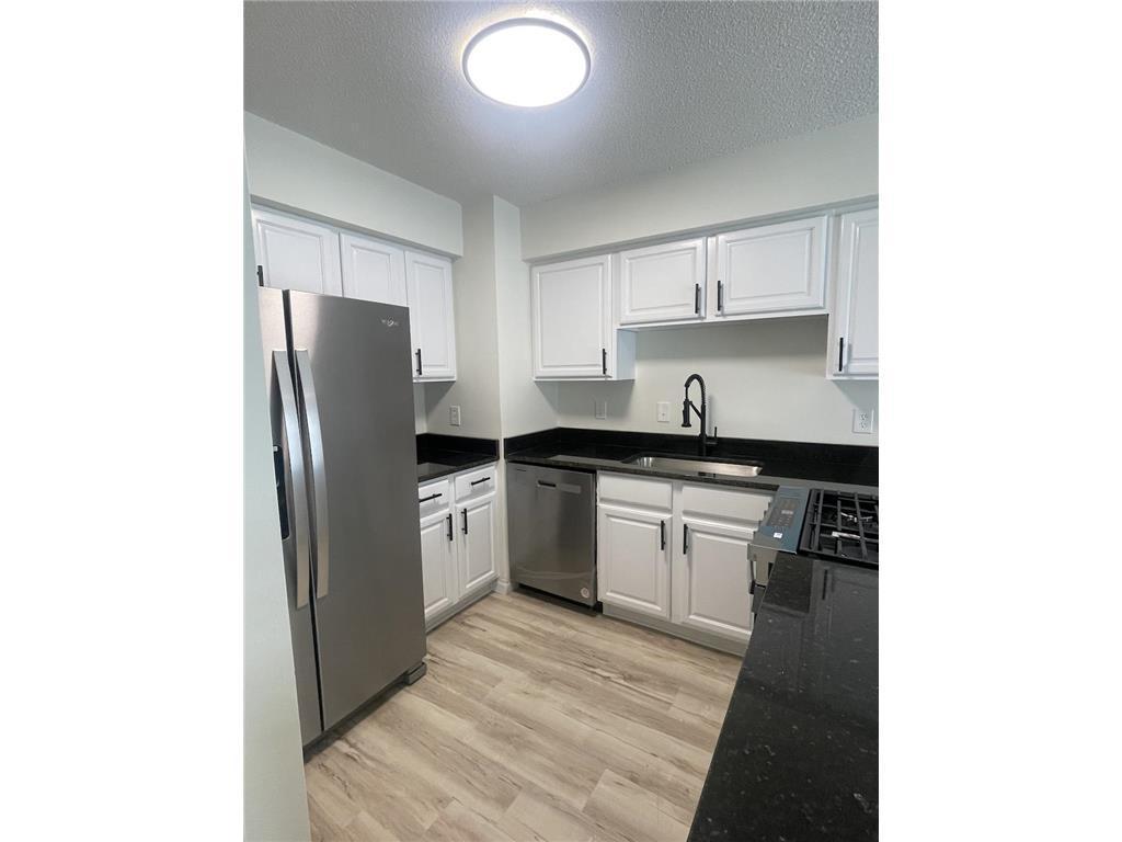 View of (TH) Side x Side at 7824 Yates Avenue, Brooklyn Park - Mike Wilen | Minnesota Team Real Estate