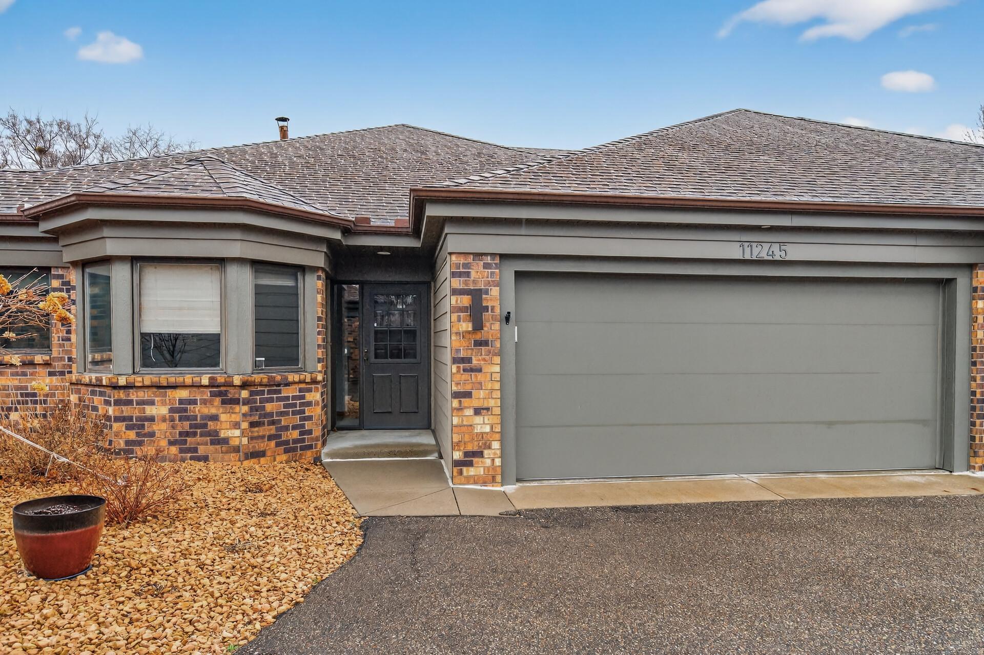 View of (TH) Side x Side at 11245 57th Avenue, Plymouth - Mike Wilen | Minnesota Team Real Estate