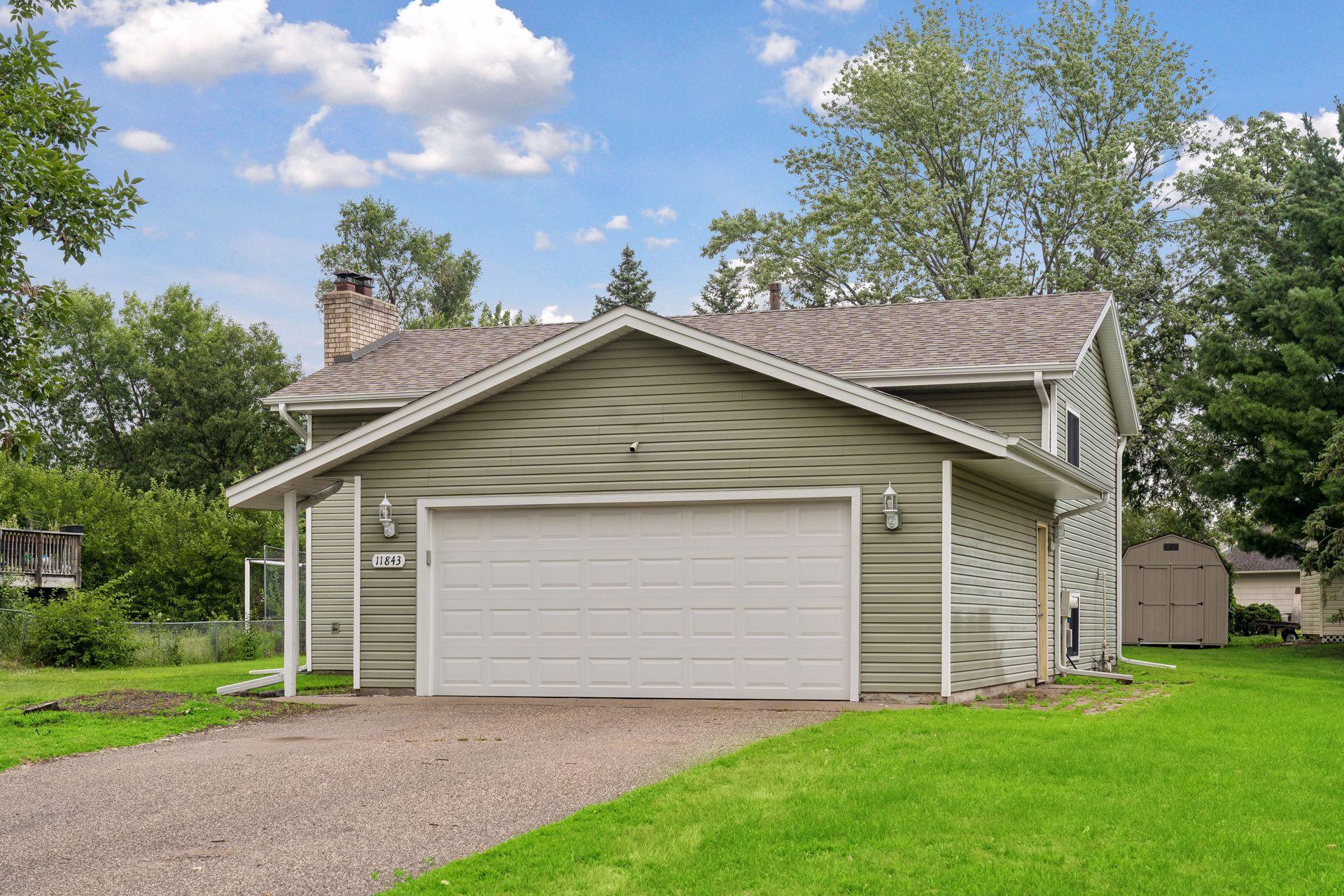 View of Single Family at 11843 Marigold Street, Coon Rapids - Mike Wilen | Minnesota Team Real Estate