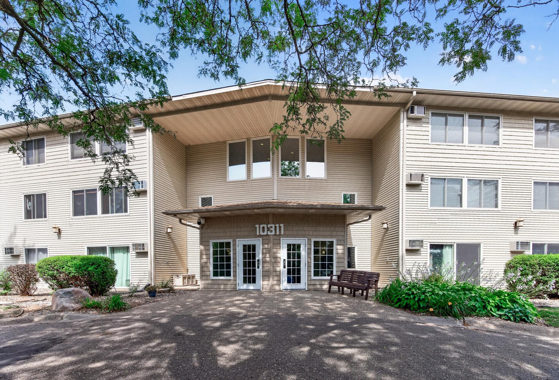 View of (CC) Low Rise (3- Levels) at 10311 Cedar Lake Road, Minnetonka - Mike Wilen | Minnesota Team Real Estate
