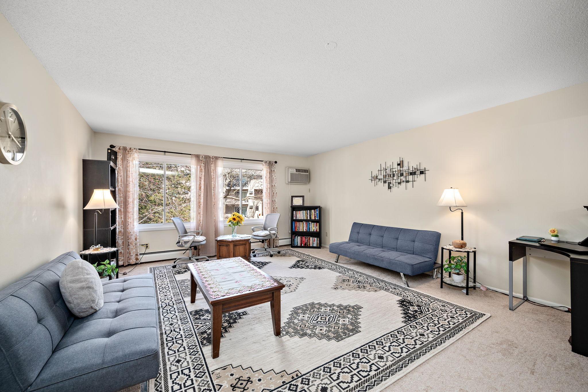 View of (CC) Low Rise (3- Levels) at 10211 Cedar Lake Road, Minnetonka - Mike Wilen | Minnesota Team Real Estate