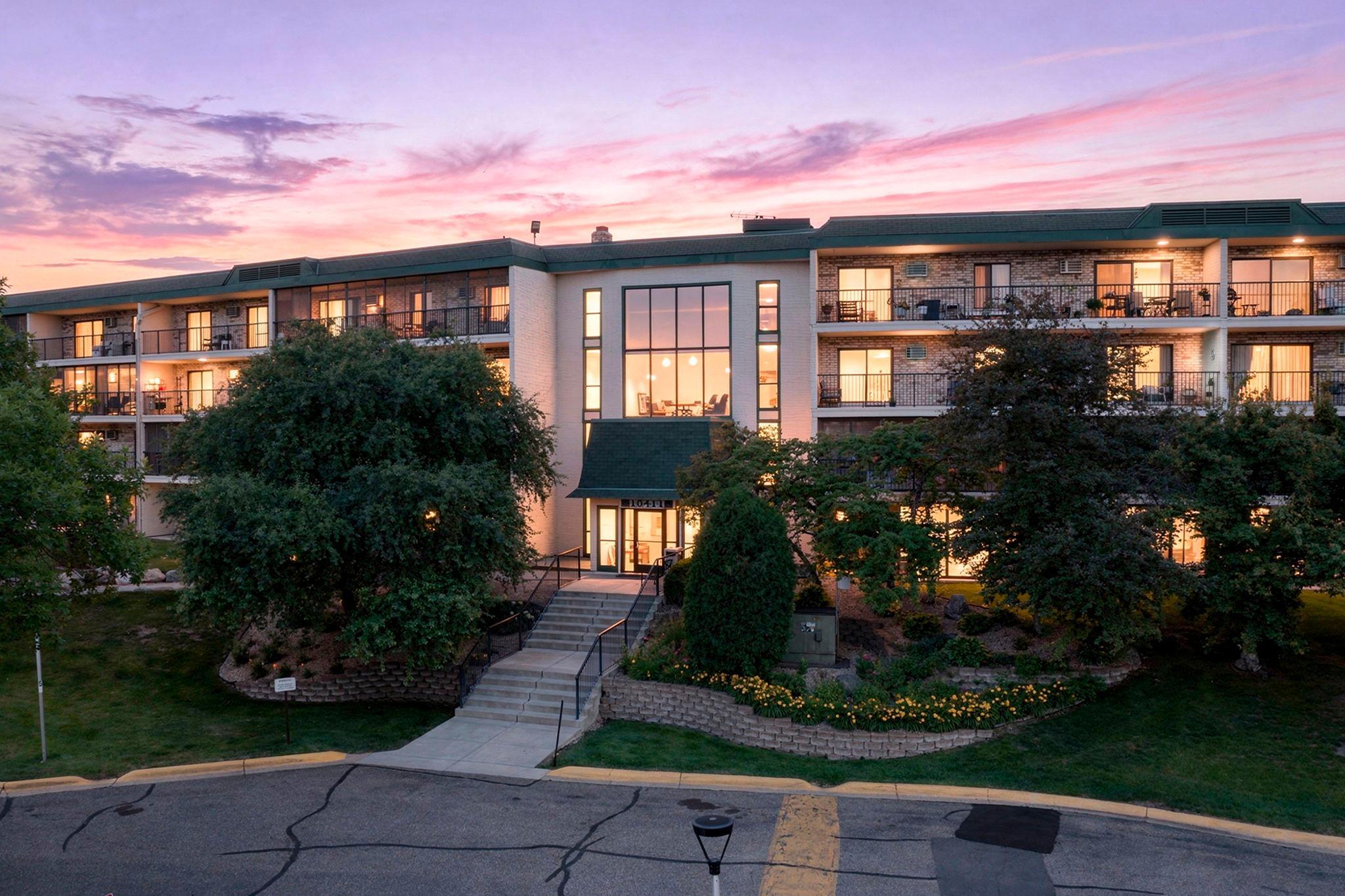 View of (CC) High Rise (4+ Levels) at 10411 Cedar Lake Road, Minnetonka - Mike Wilen | Minnesota Team Real Estate