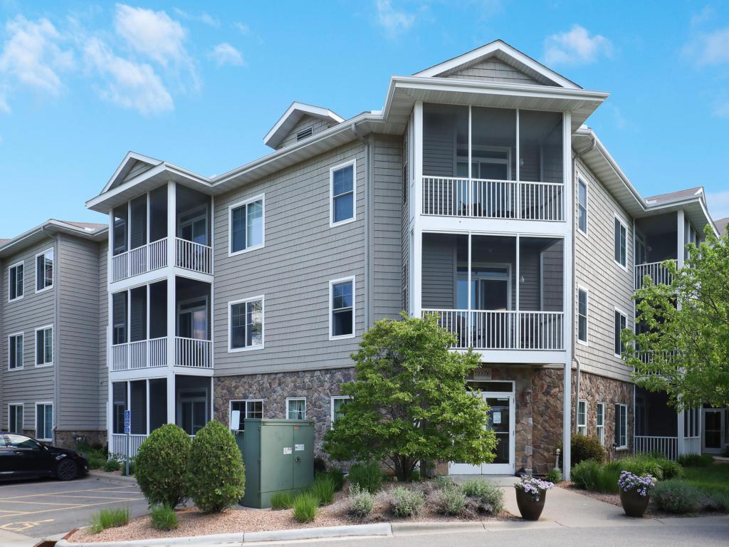 View of (CC) Low Rise (3- Levels) at 110696 Village Road, Chaska - Mike Wilen | Minnesota Team Real Estate