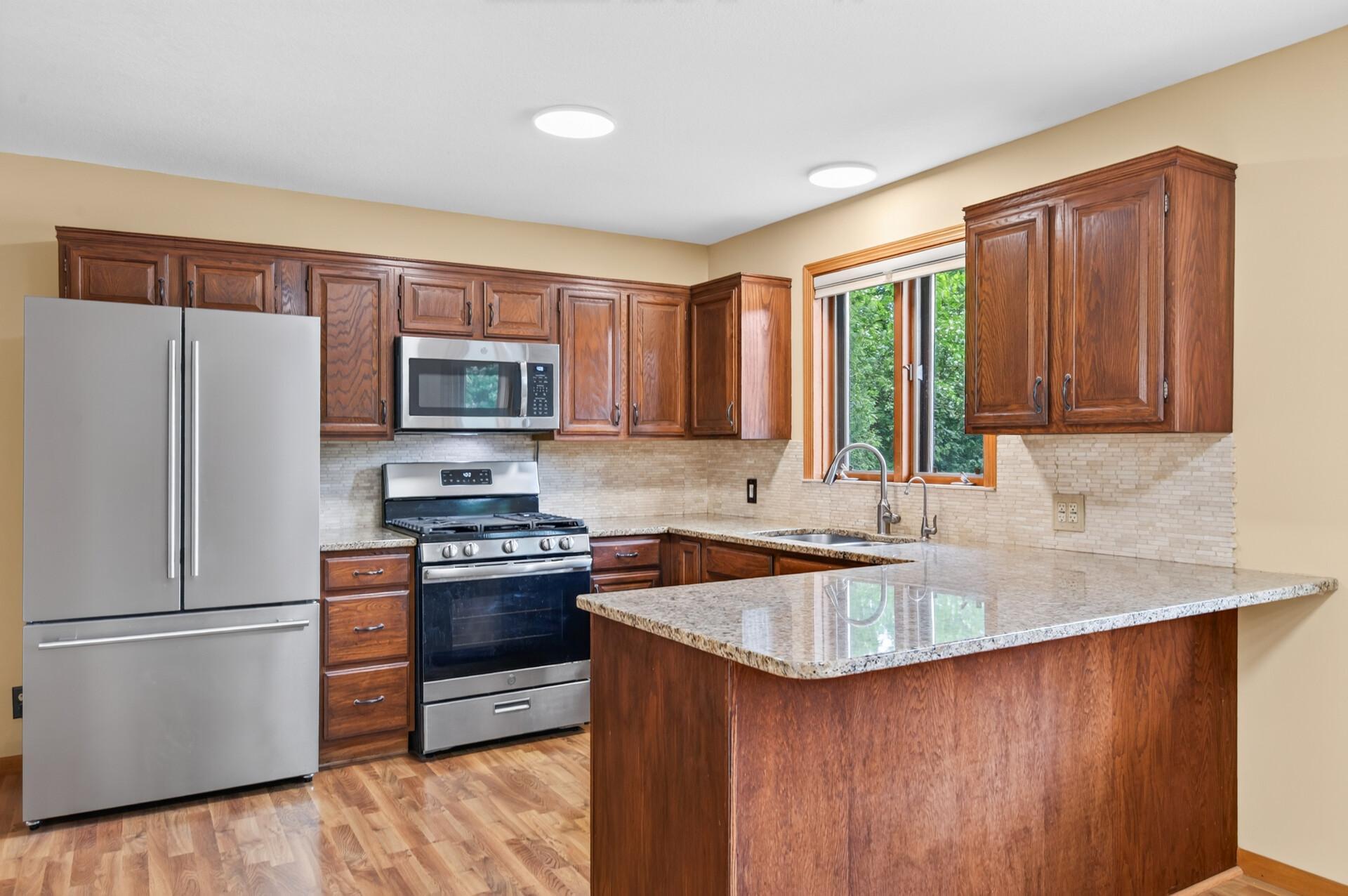 View of Residential at 7712 Riverdale Drive, Brooklyn Park MN 55444, Brooklyn Park (12 of 59) - Mike Wilen | Minnesota Team Real Estate