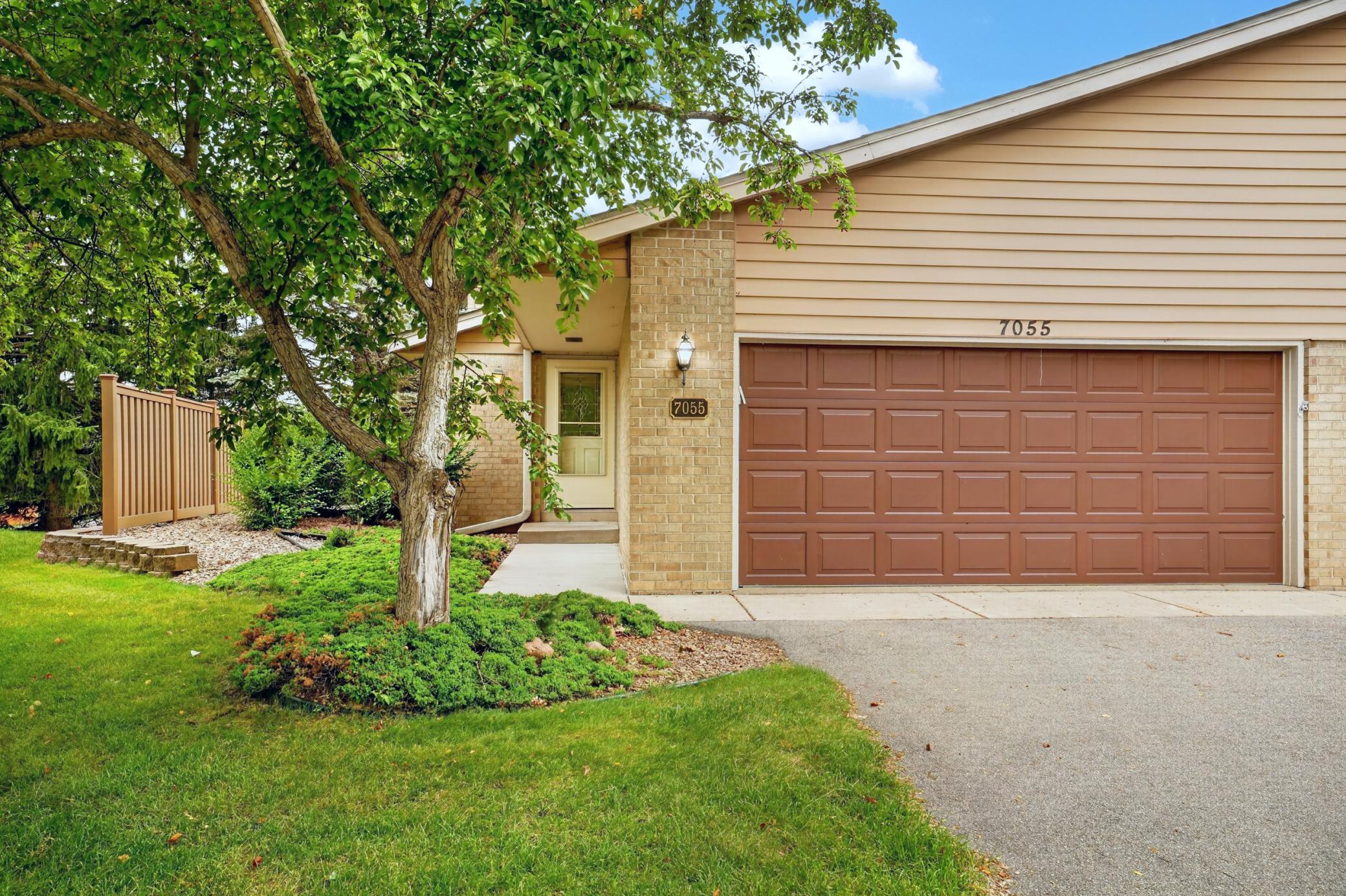 View of (TH) Side x Side at 7055 Robinwood Trail, Woodbury - Mike Wilen | Minnesota Team Real Estate