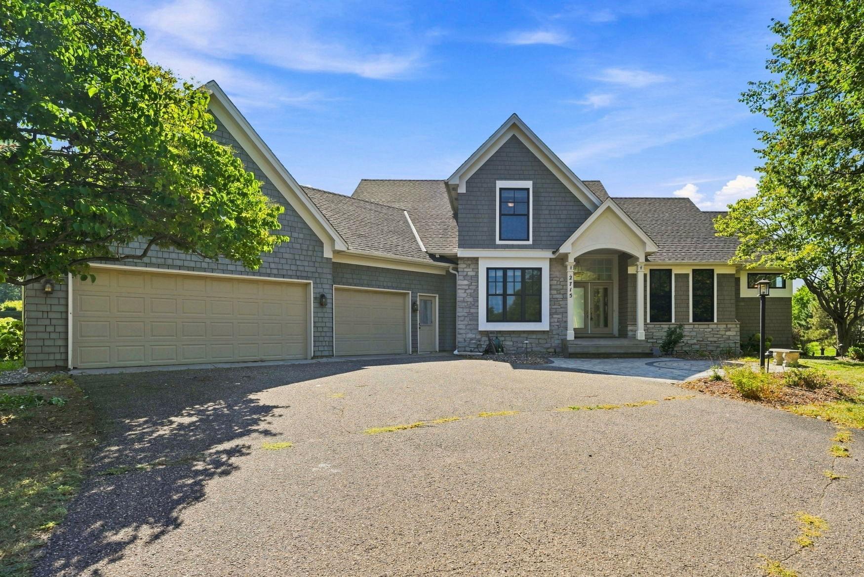 View of Single Family at 2715 Edgewater Bay, Woodbury - Mike Wilen | Minnesota Team Real Estate