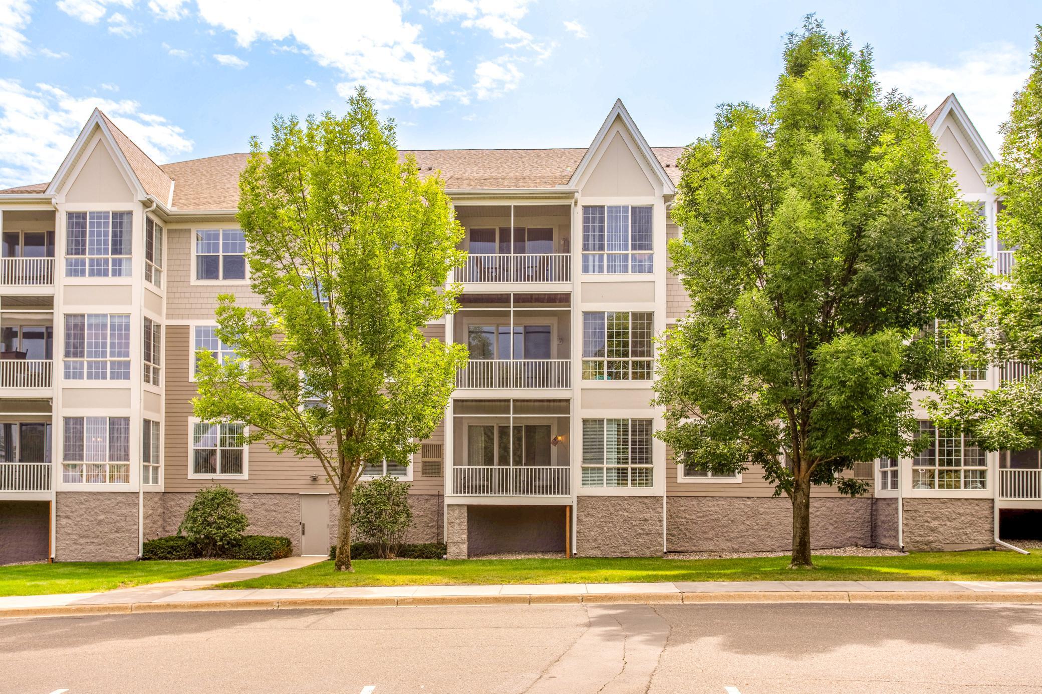 View of (CC) Low Rise (3- Levels) at 100 Clydesdale Trail, Medina - Mike Wilen | Minnesota Team Real Estate