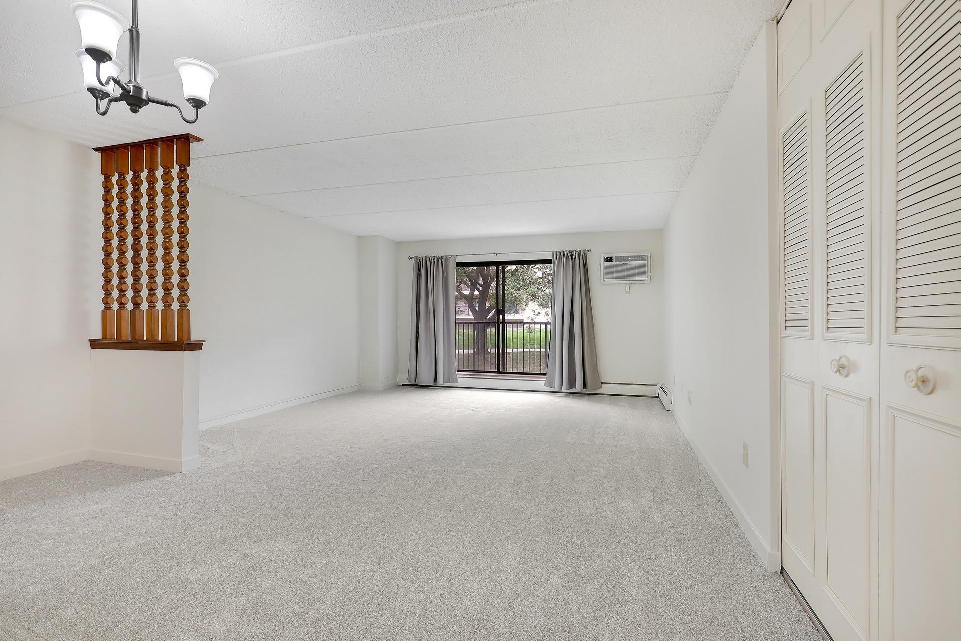 View of (CC) High Rise (4+ Levels) at 10411 Cedar Lake Road, Minnetonka - Mike Wilen | Minnesota Team Real Estate