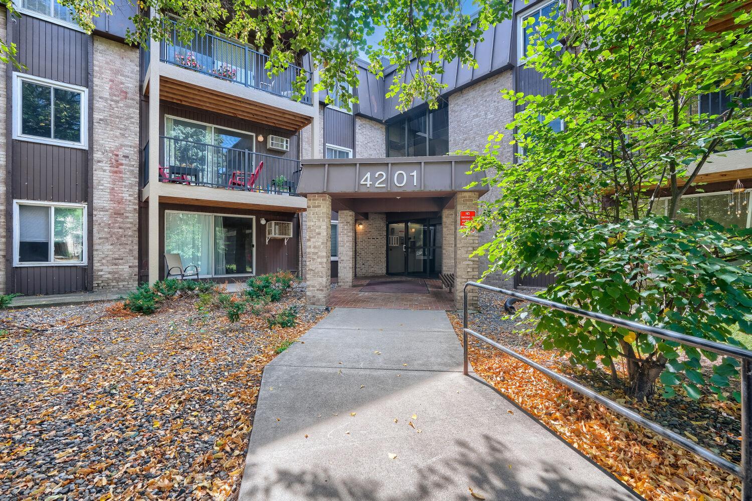 View of (CC) Low Rise (3- Levels) at 4201 Lakeside Avenue, Brooklyn Center - Mike Wilen | Minnesota Team Real Estate