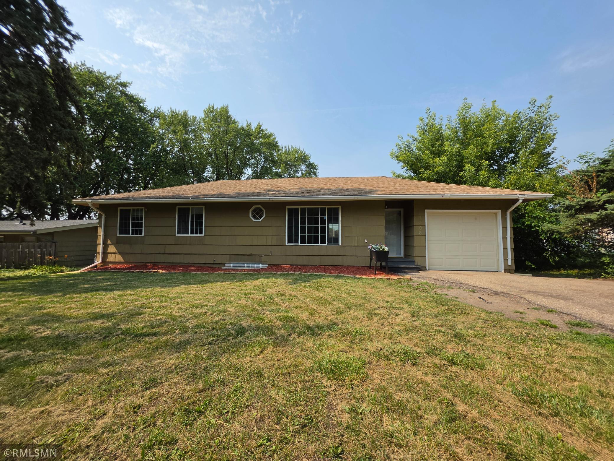 View of Single Family at 1306 Woodhill Road, Burnsville - Mike Wilen | Minnesota Team Real Estate