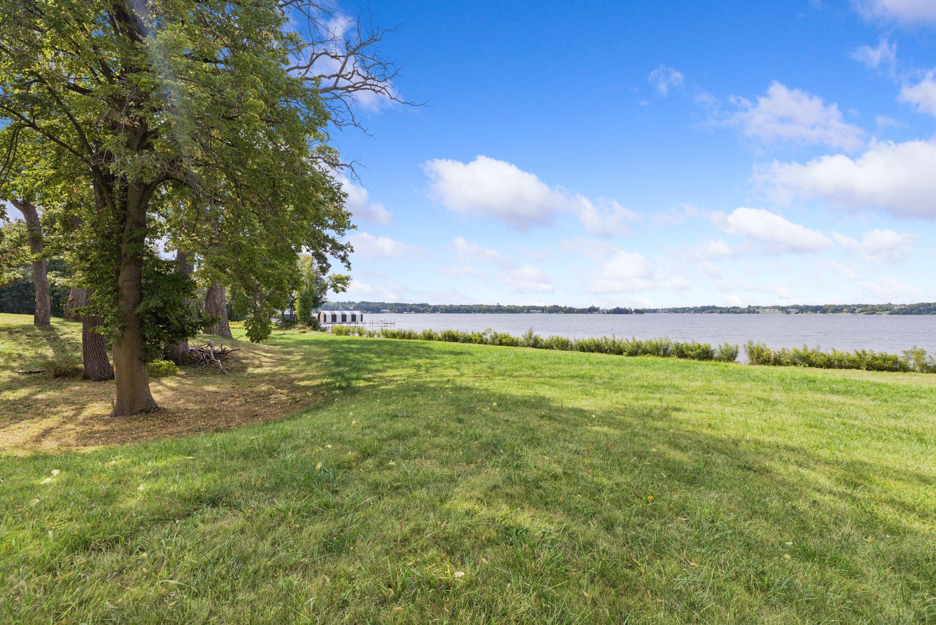 View of Lake Property, Residential Lot at 555 Bushaway Road, Wayzata - Mike Wilen | Minnesota Team Real Estate