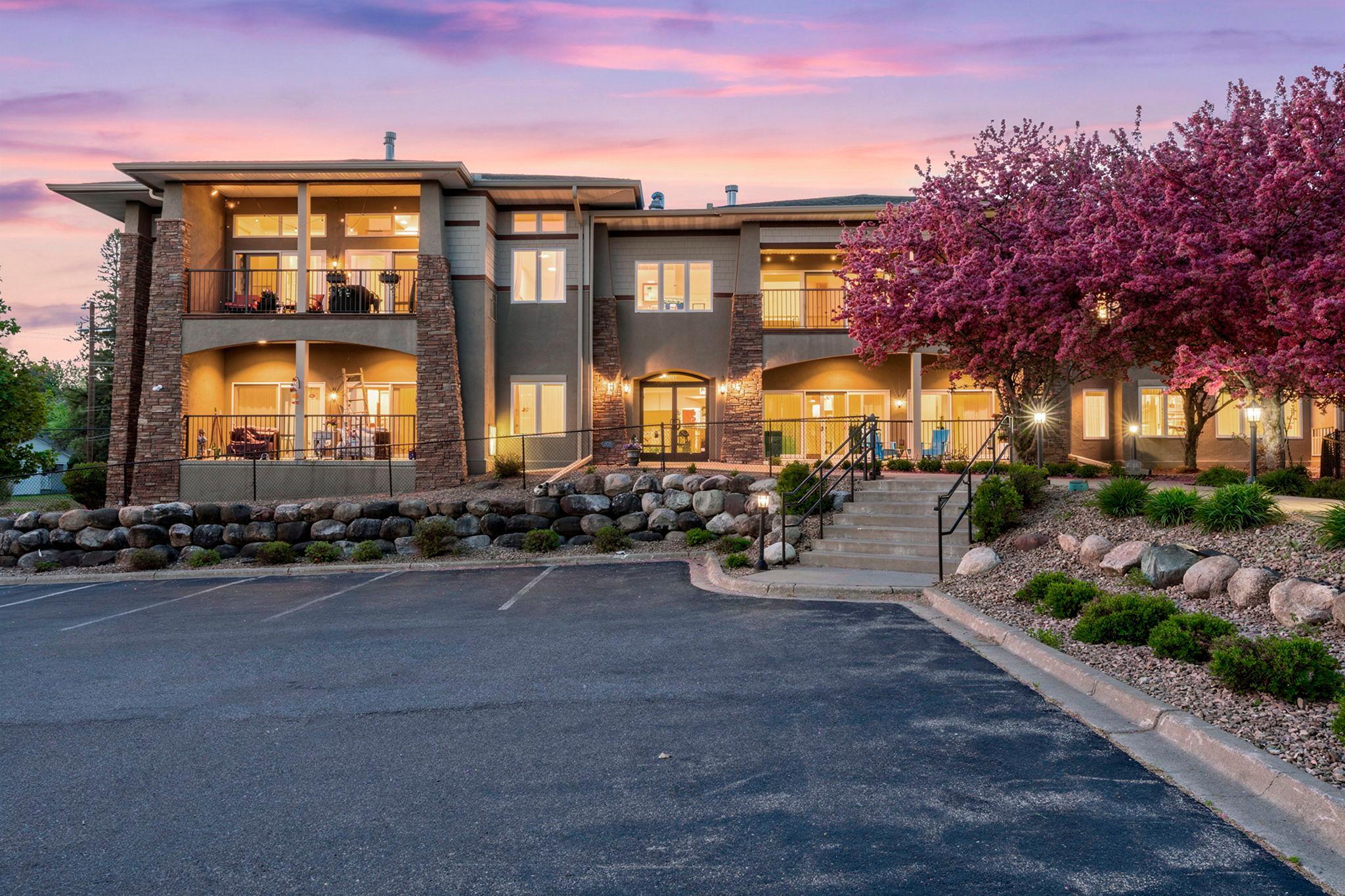 View of (CC) Low Rise (3- Levels) at 10806 Shore Drive, Plymouth - Mike Wilen | Minnesota Team Real Estate