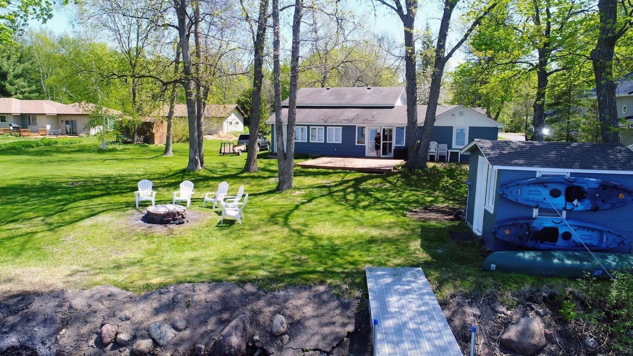 View of Single Family at 1180 Malone Park Road, Isle - Mike Wilen | Minnesota Team Real Estate