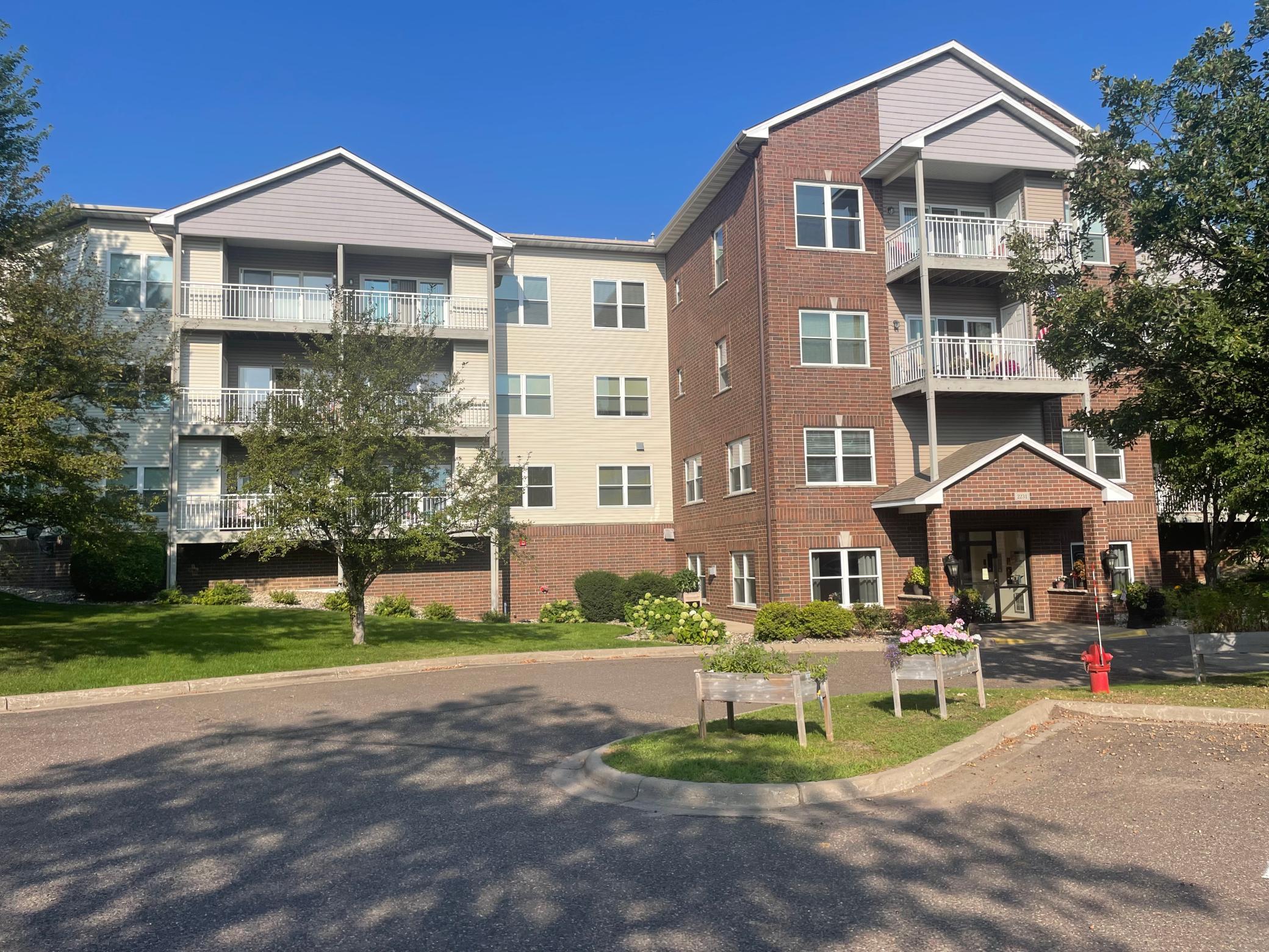 View of (CC) Low Rise (3- Levels) at 2231 Penn Place, North Saint Paul - Mike Wilen | Minnesota Team Real Estate