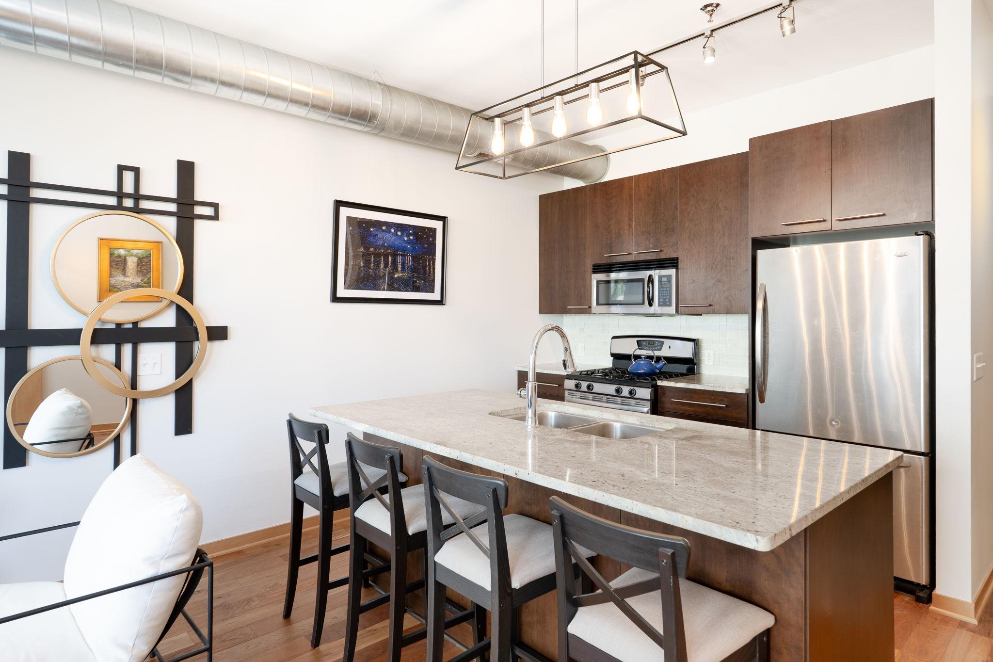 View of (CC) High Rise (4+ Levels) at 1211 Lagoon Avenue, Minneapolis - Mike Wilen | Minnesota Team Real Estate