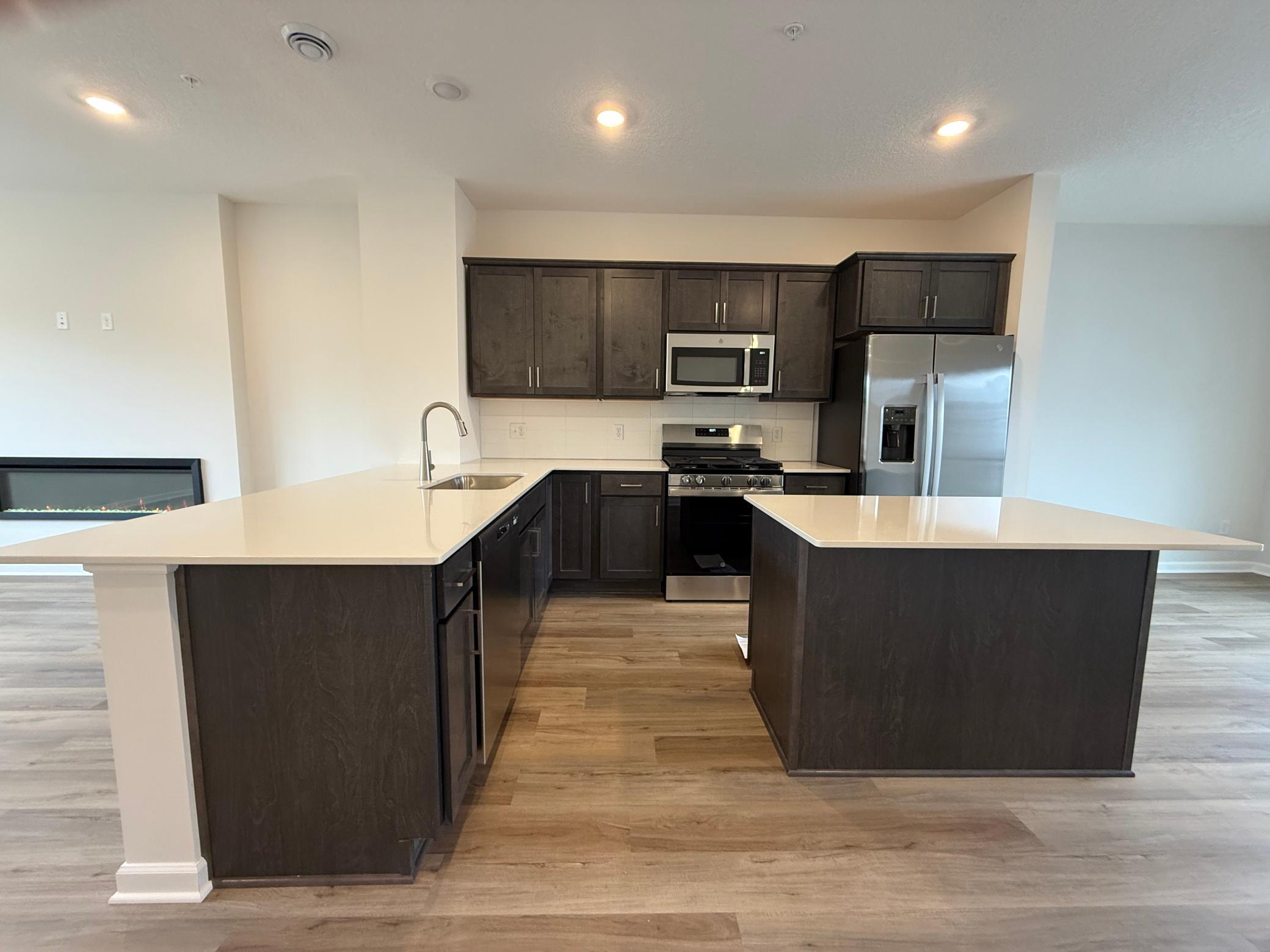 View of (TH) Side x Side at 13628 Willow Drive, Rogers - Mike Wilen | Minnesota Team Real Estate