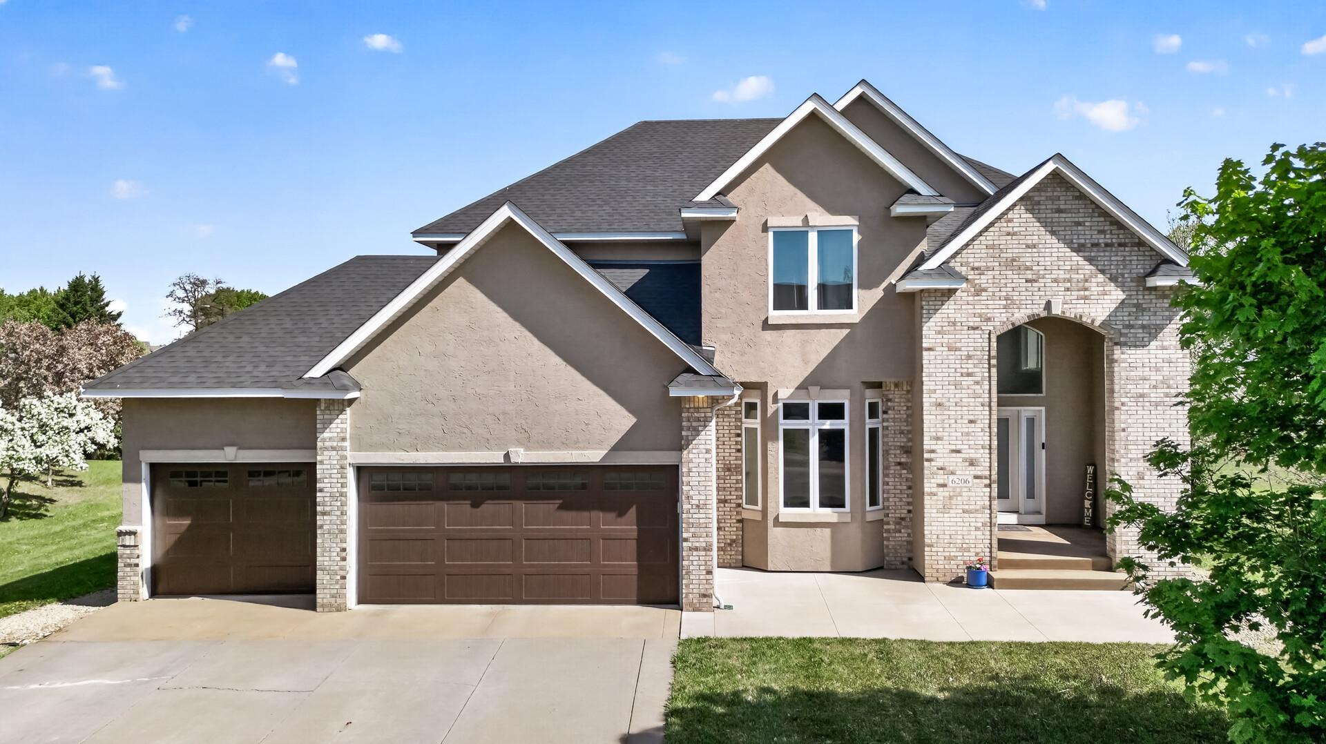 View of Single Family at 6206 106th Avenue, Brooklyn Park - Mike Wilen | Minnesota Team Real Estate